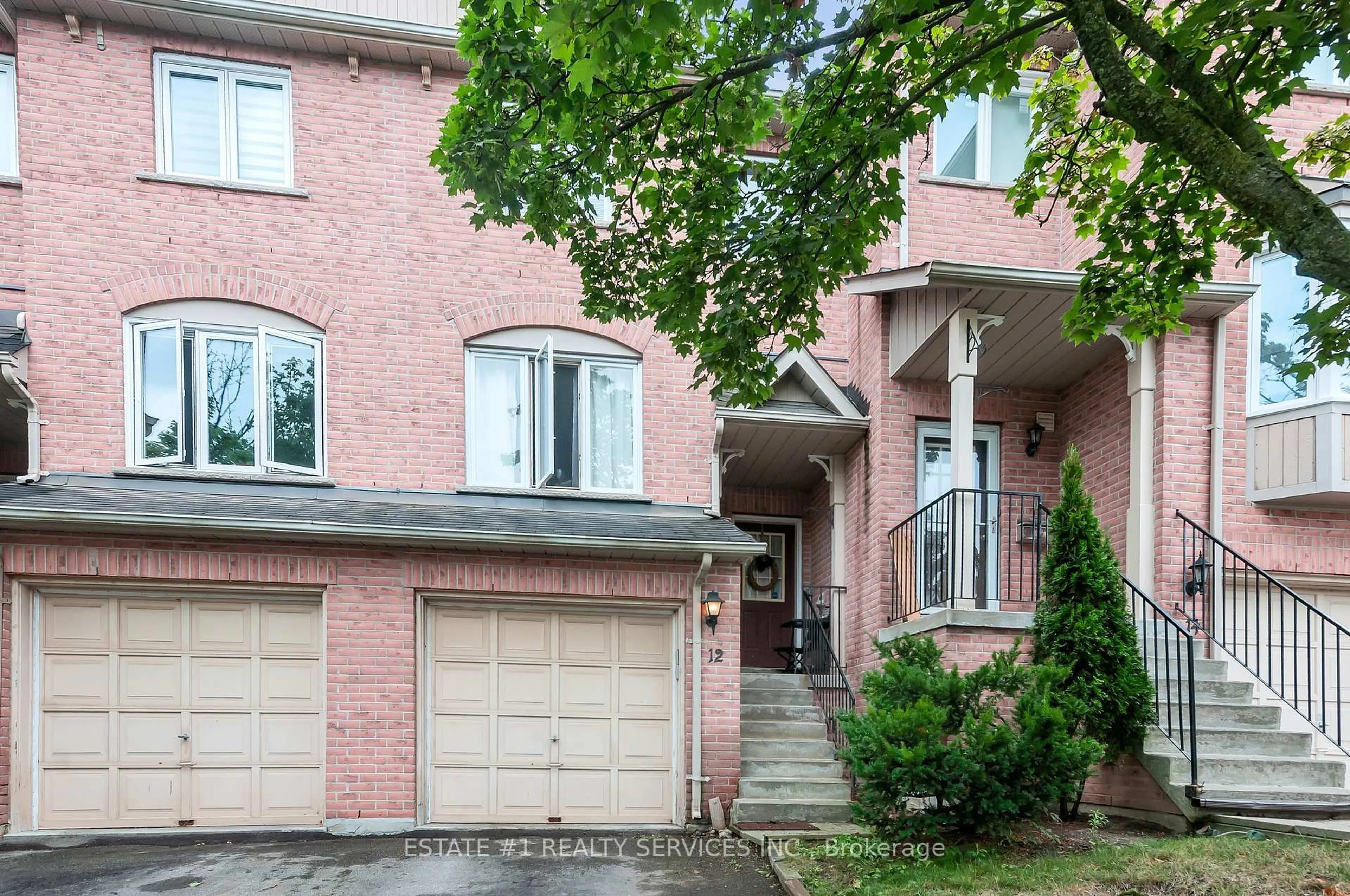 Home with brick exterior material, street for 12 Rougehaven Way, Markham Ontario L3P 7W5