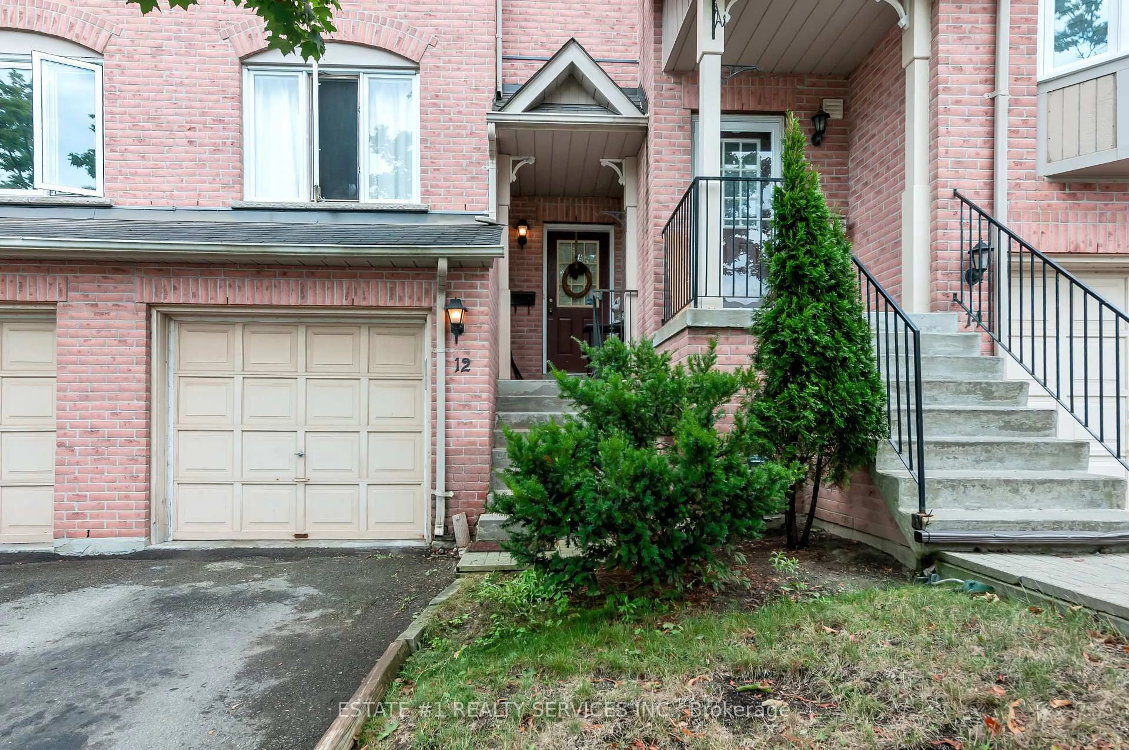 Home with brick exterior material, street for 12 Rougehaven Way, Markham Ontario L3P 7W5