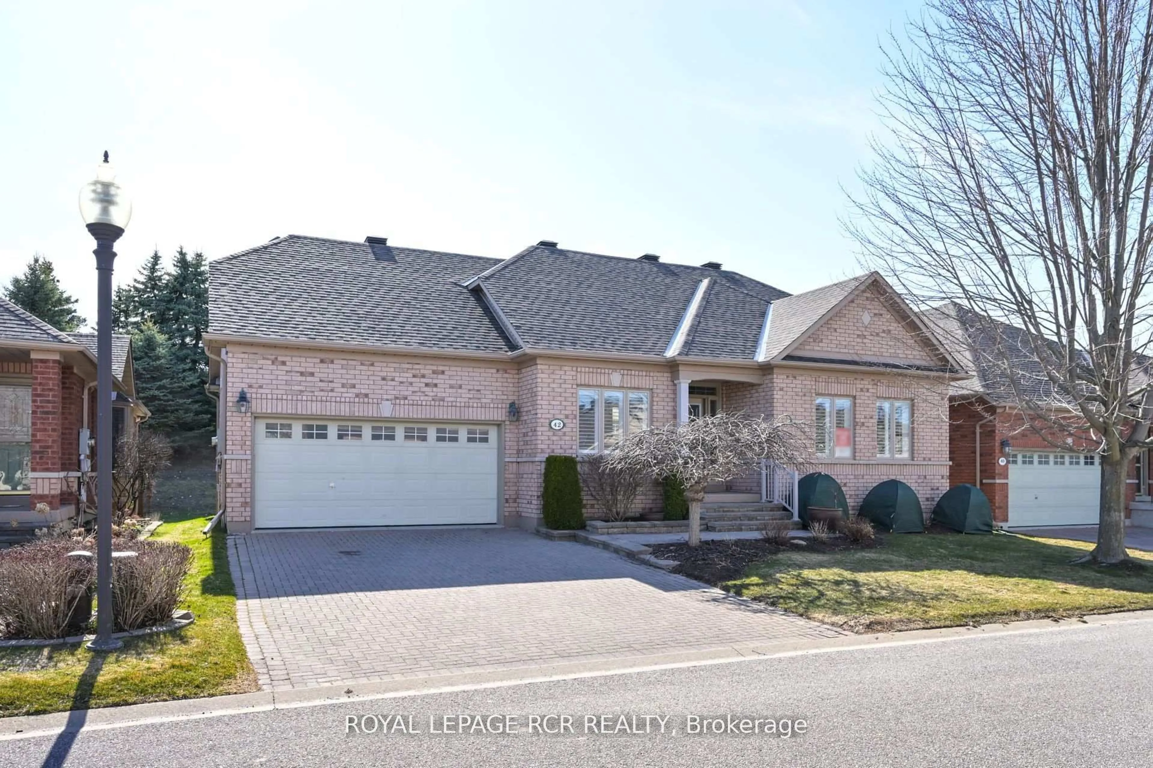 Home with brick exterior material, street for 42 Napa Ridge, New Tecumseth Ontario L9R 2E4