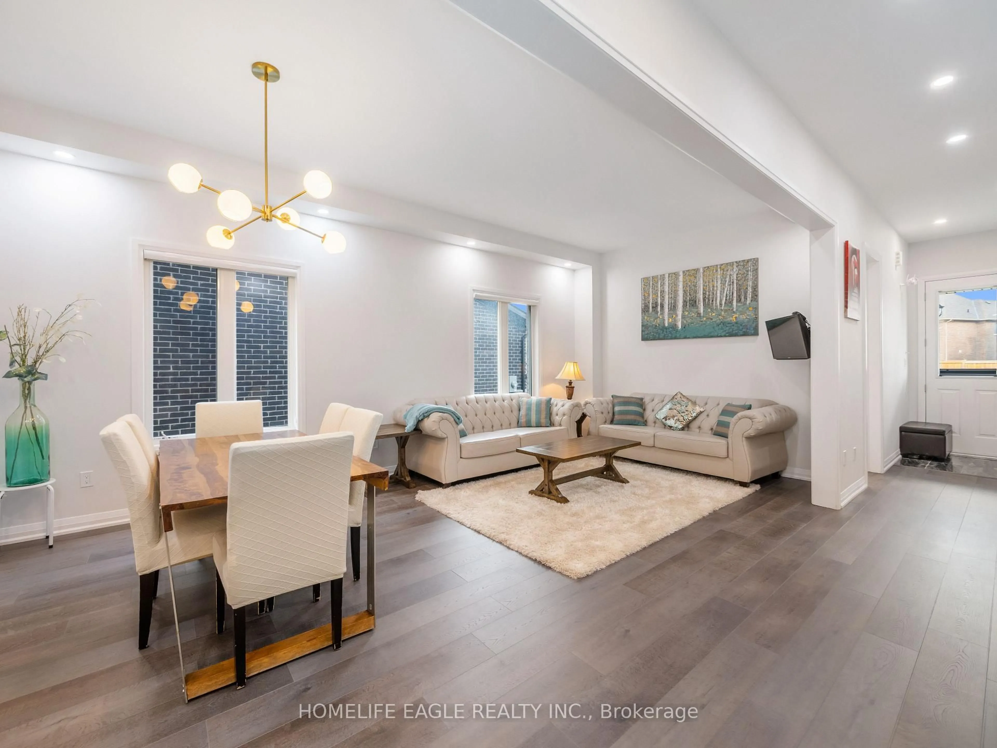 Living room with furniture, unknown for 1028 Hardy Way, Innisfil Ontario L0L 1W0