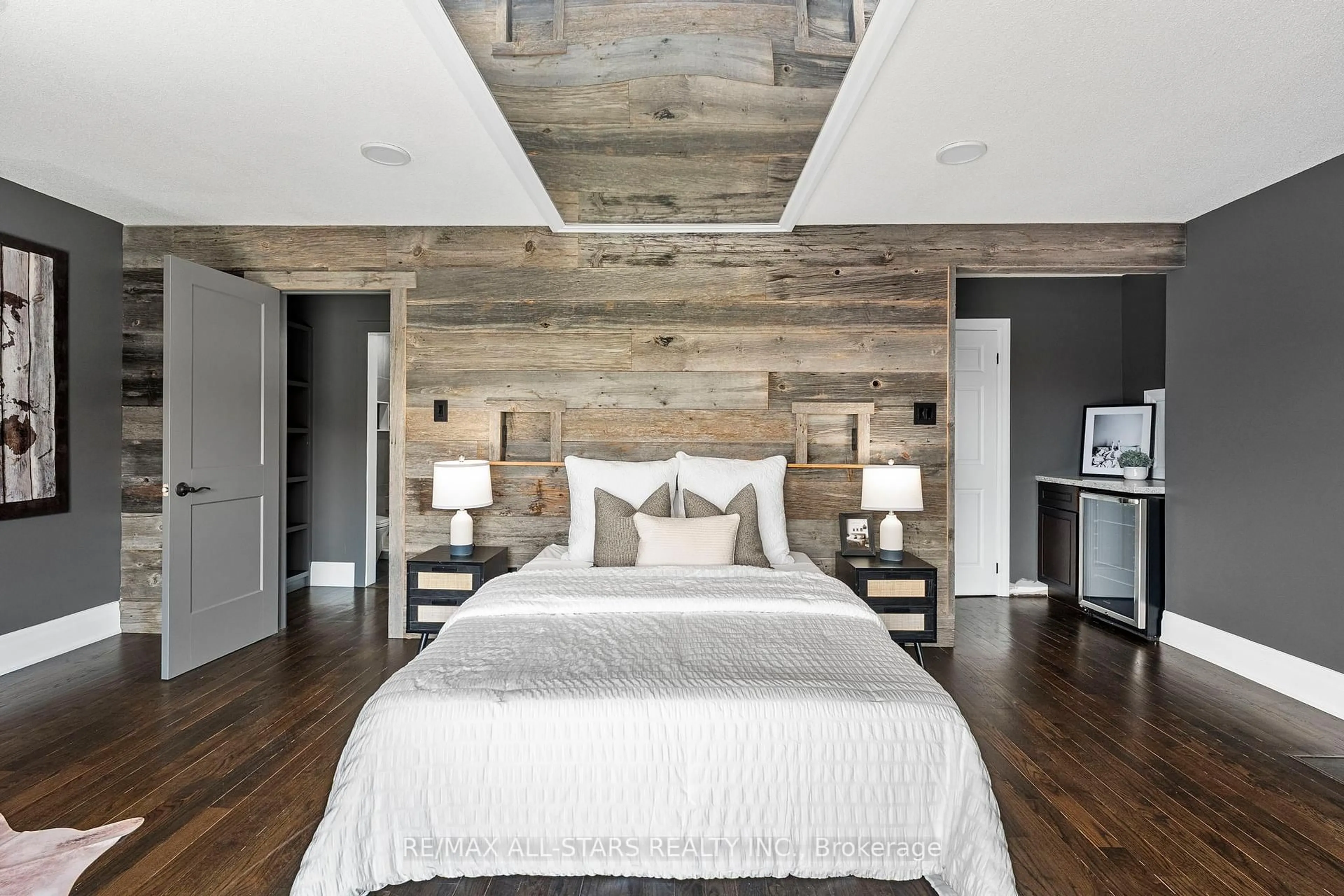 Bedroom with bed, wood/laminate floor for 21002 Leslie St, East Gwillimbury Ontario L0G 1R0