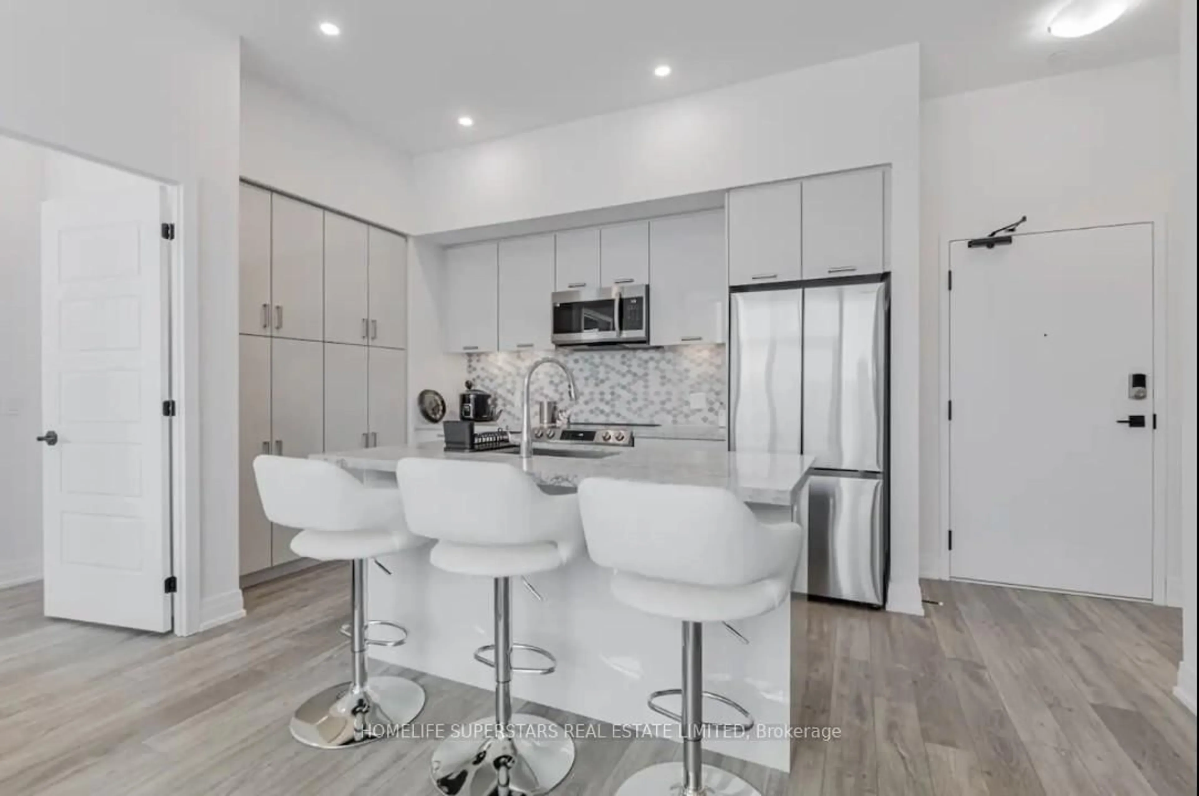 Open concept kitchen, ceramic/tile floor for 415 Sea Ray Ave #407, Innisfil Ontario L9S 0R5