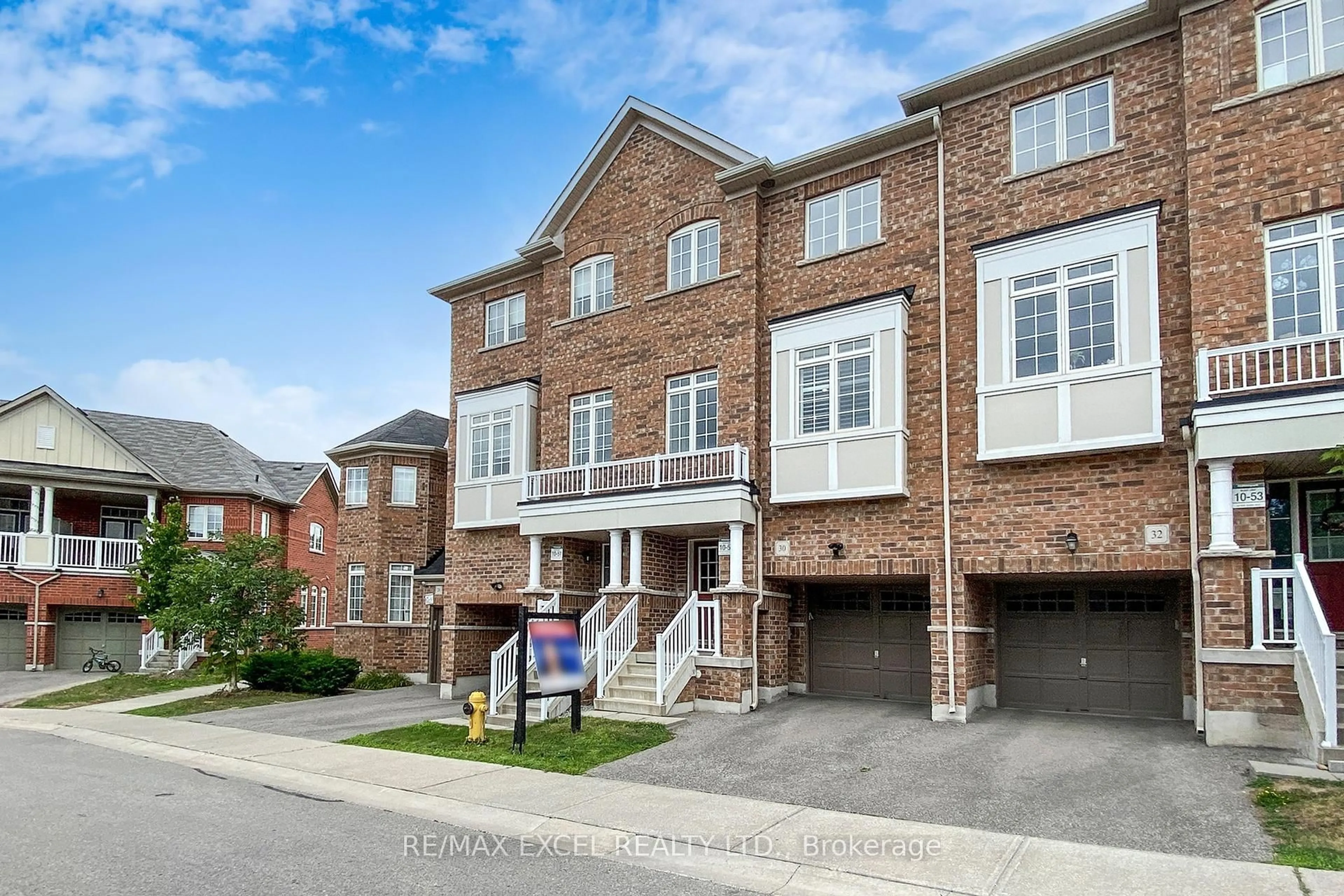 Home with brick exterior material, street for 30 Roy Grove Way, Markham Ontario L6E 0T6