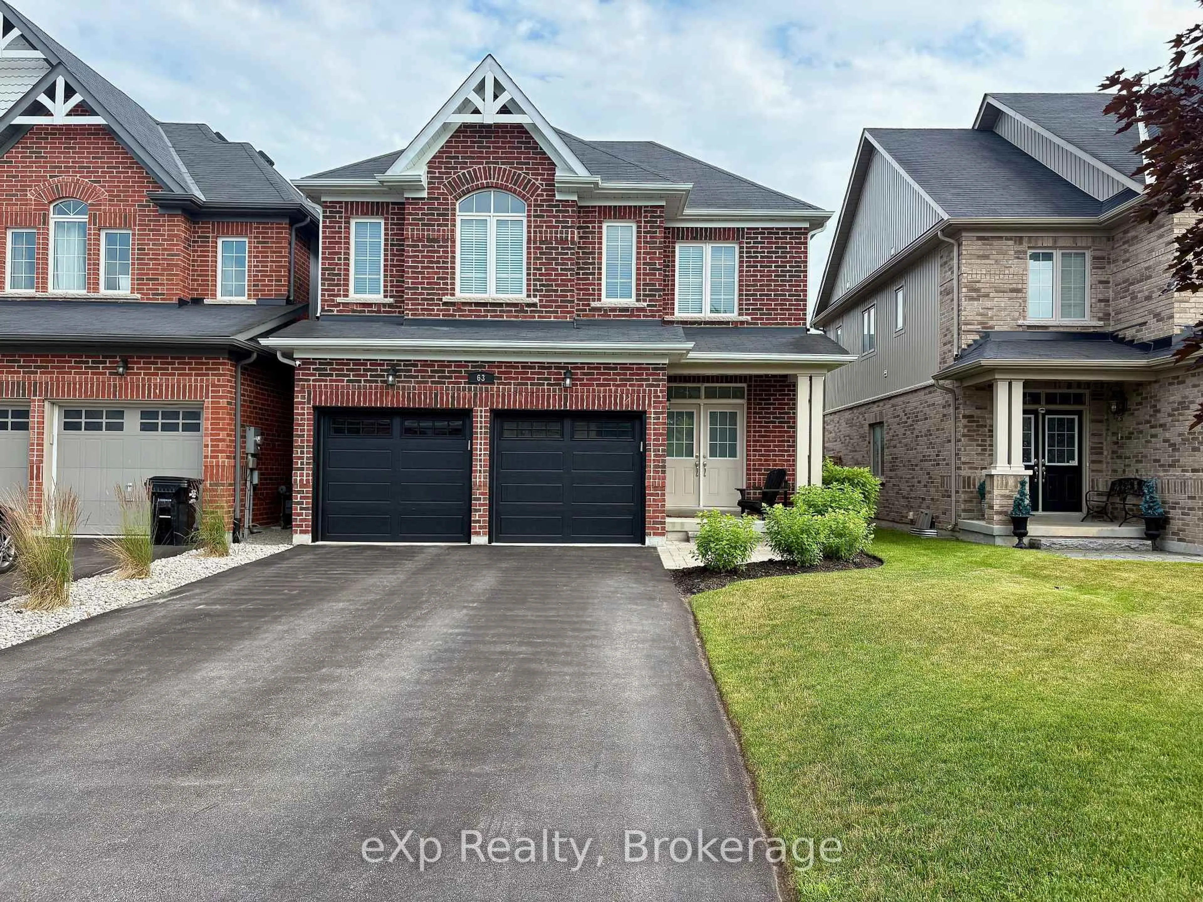 Home with brick exterior material, street for 63 Decarolis Cres, Essa Ontario L0M 1B4