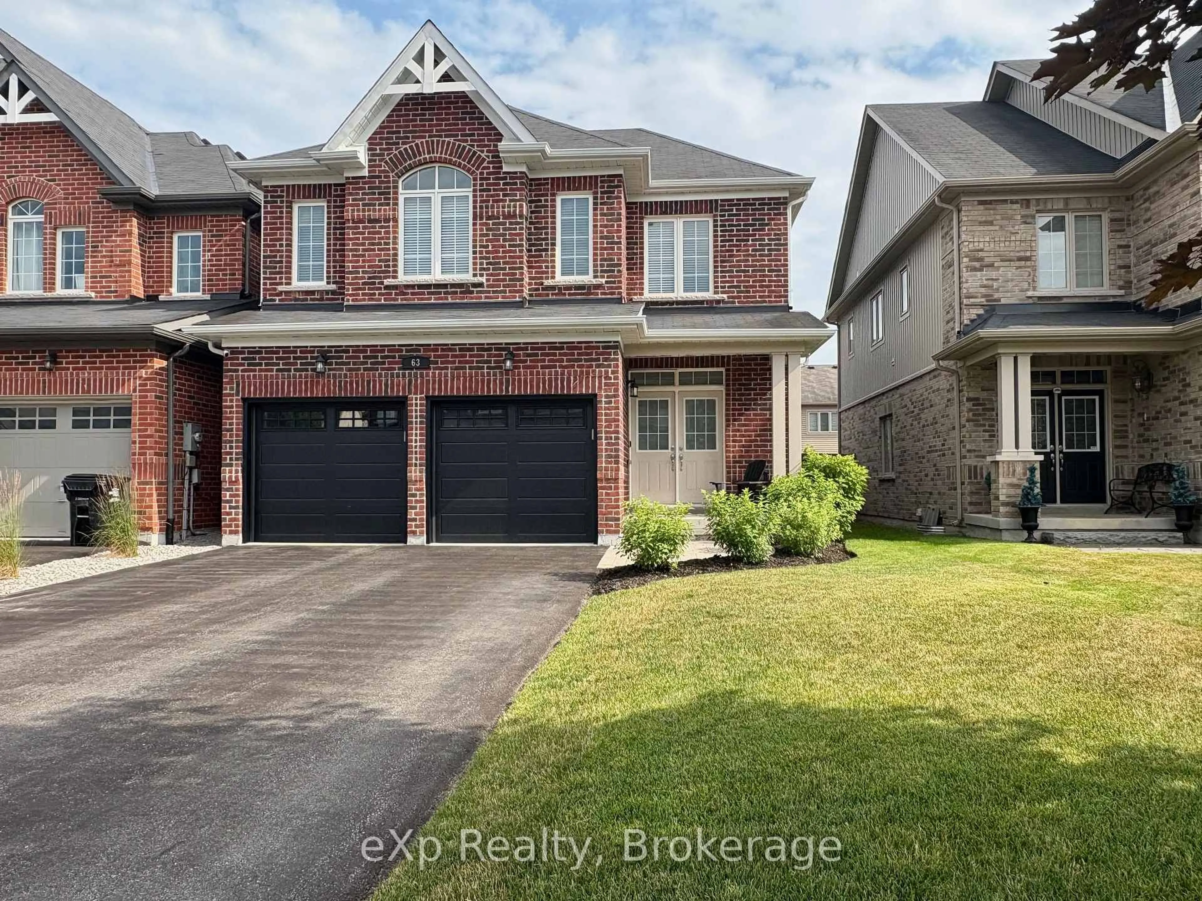 Home with brick exterior material, street for 63 Decarolis Cres, Essa Ontario L0M 1B4