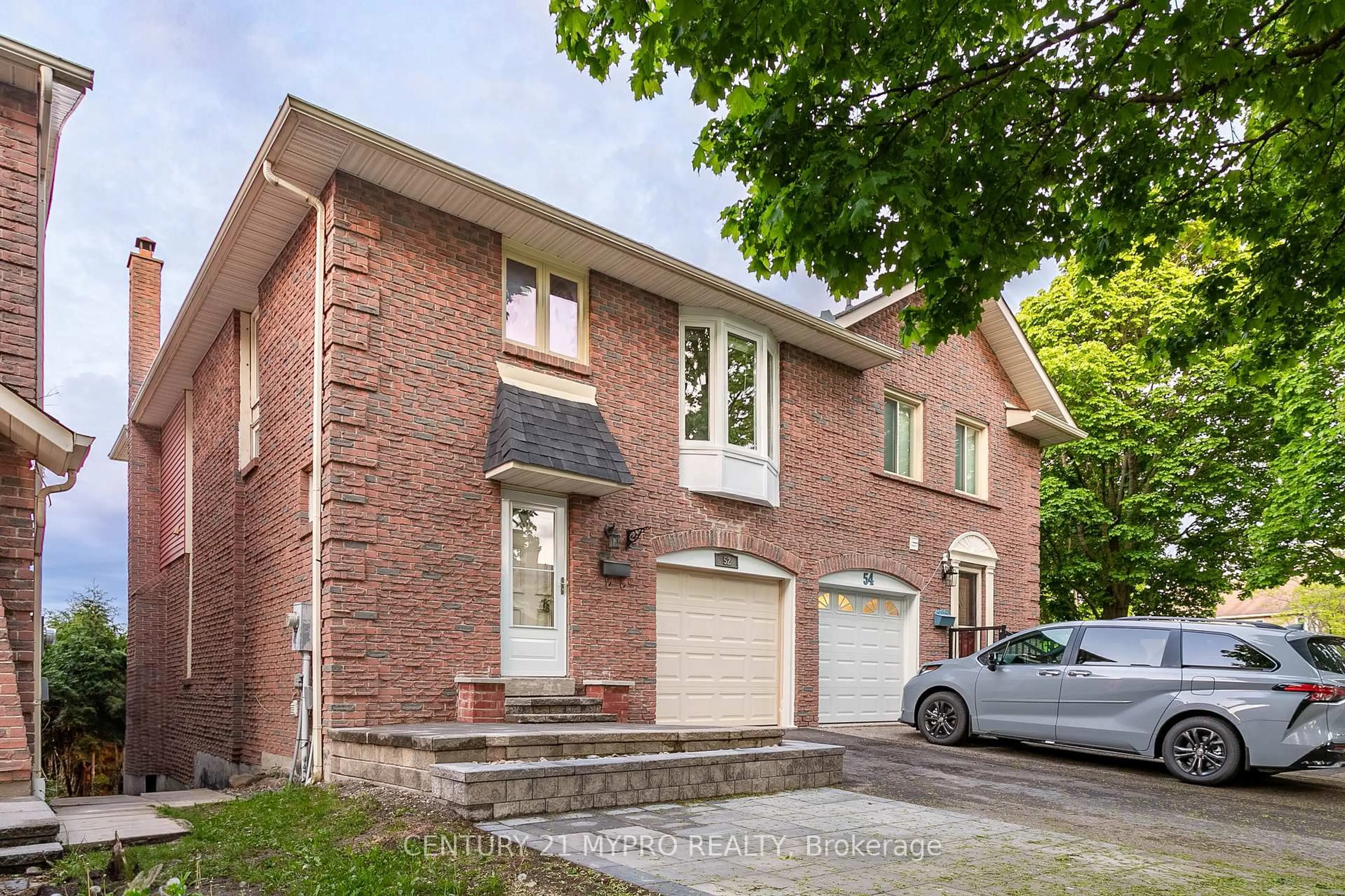 Home with brick exterior material, street for 52 Foxglove Crt, Markham Ontario L3R 3Y3