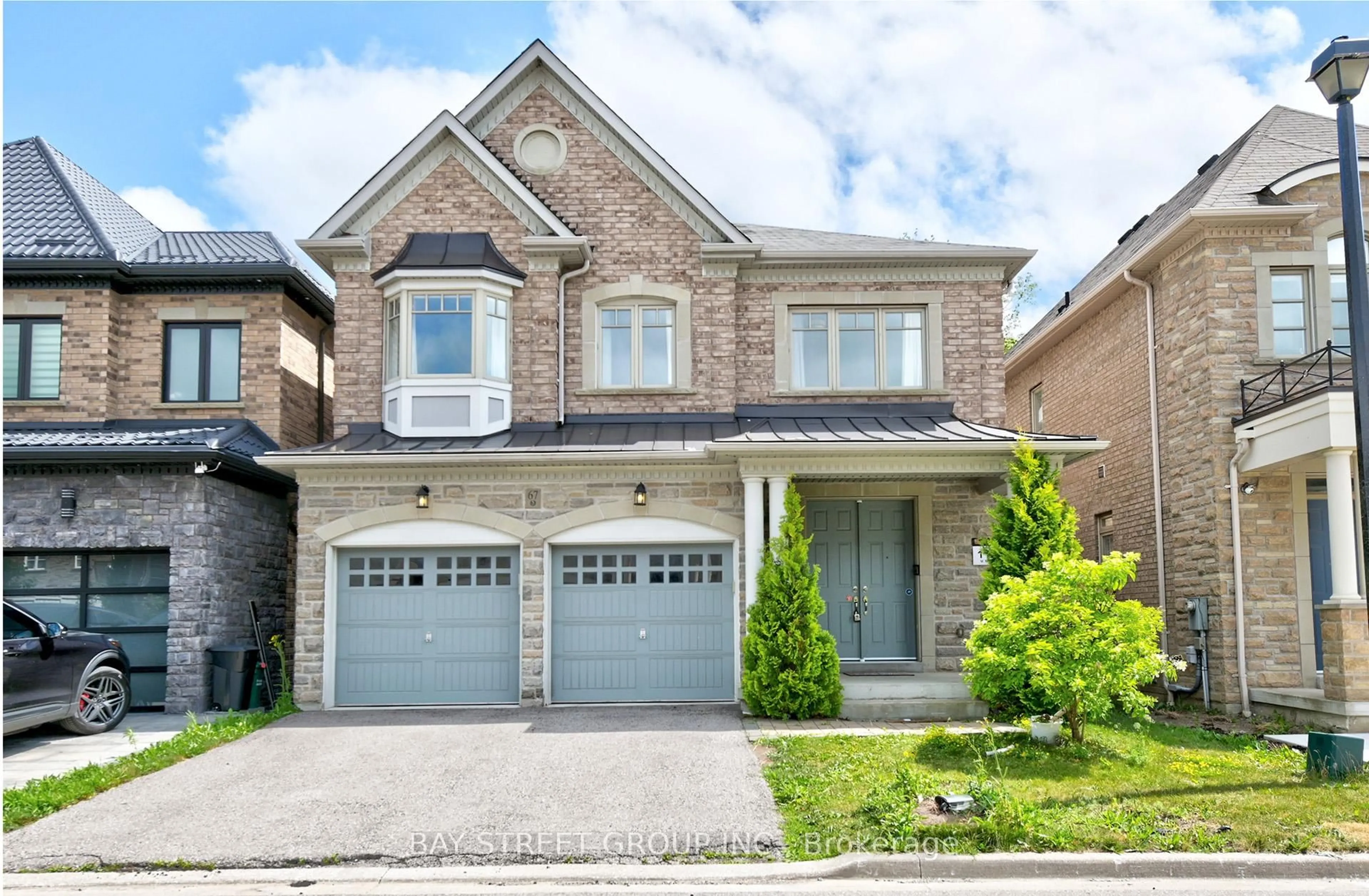 Home with brick exterior material, street for 67 Meadowsweet Lane, Richmond Hill Ontario L4E 1B9