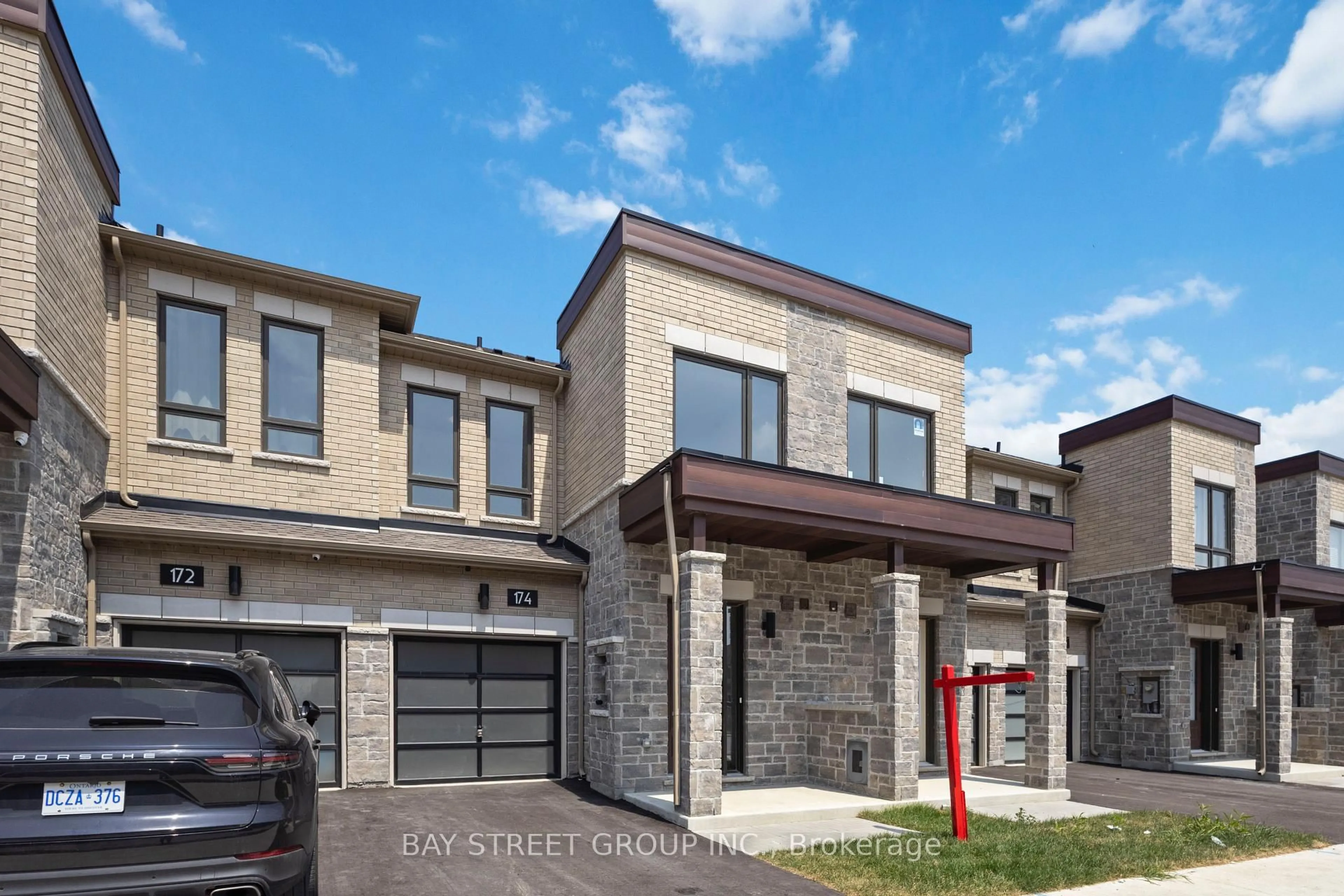 Home with brick exterior material, street for 174 mumbai Dr, Markham Ontario L3S 0G5