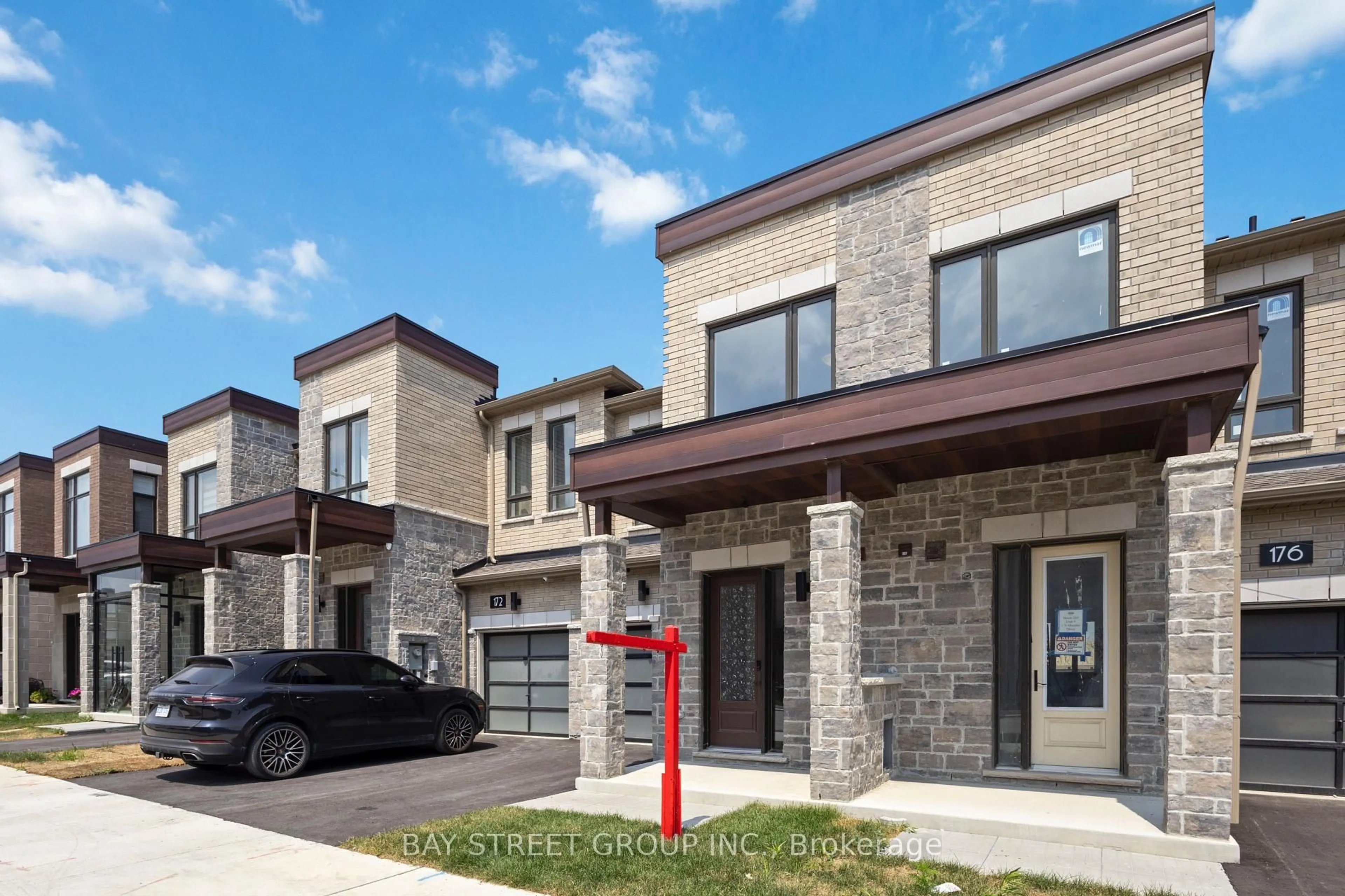 Home with brick exterior material, street for 174 mumbai Dr, Markham Ontario L3S 0G5