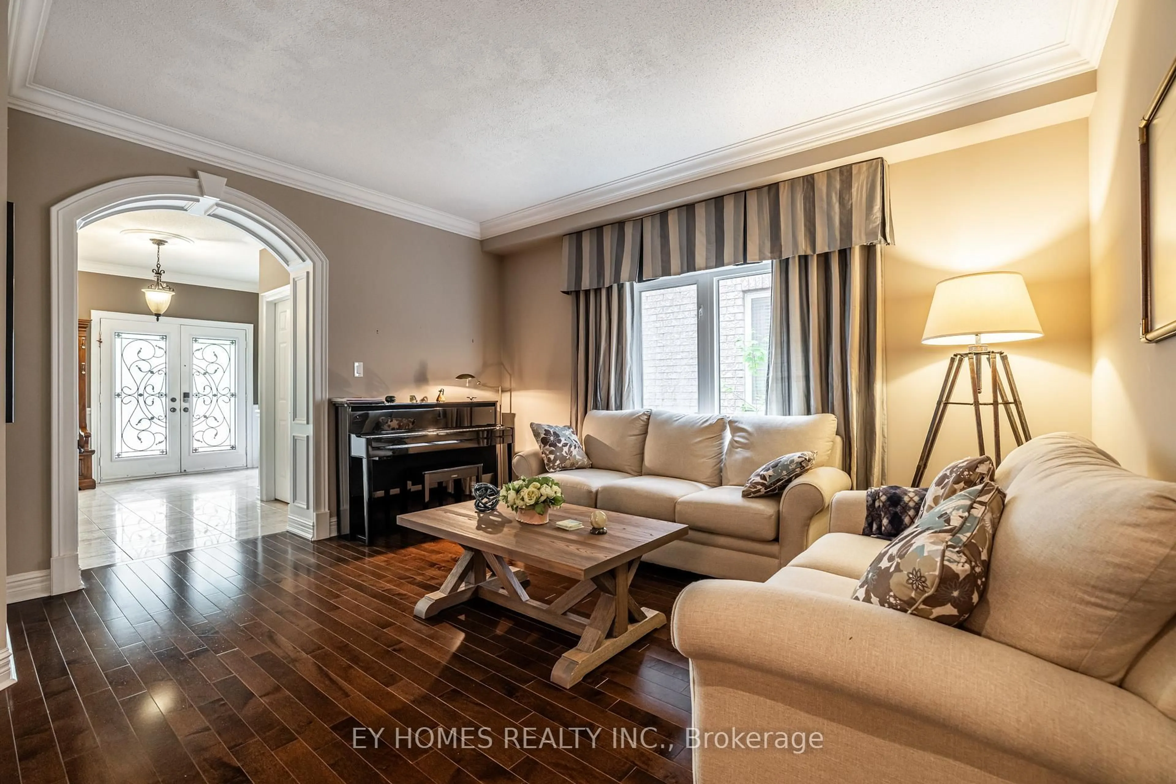 Living room with furniture, wood/laminate floor for 50 Schuster Lane, Vaughan Ontario L4J 8Y7