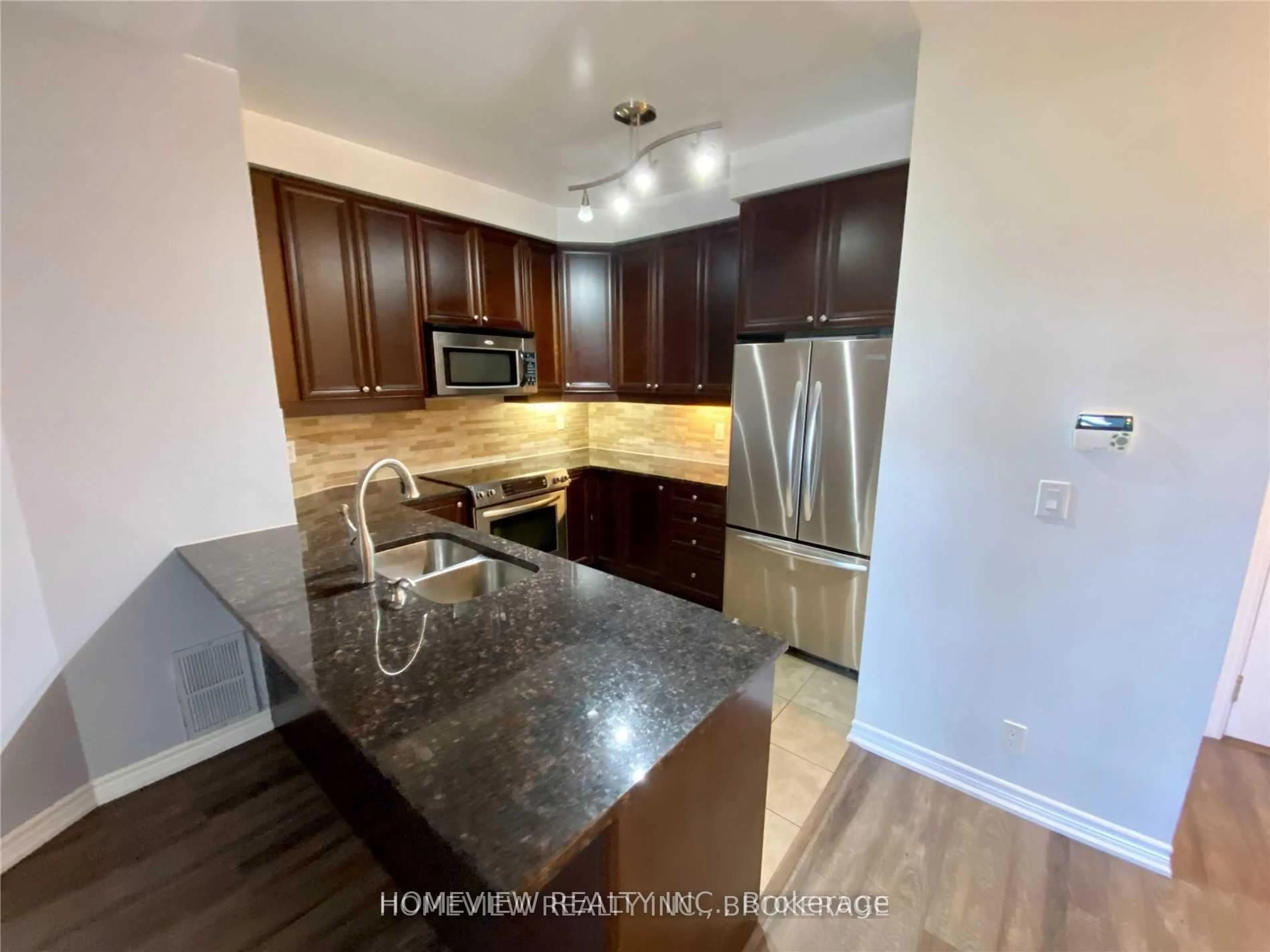 Open concept kitchen, unknown for 9235 Jane St #210, Vaughan Ontario L6A 0J8