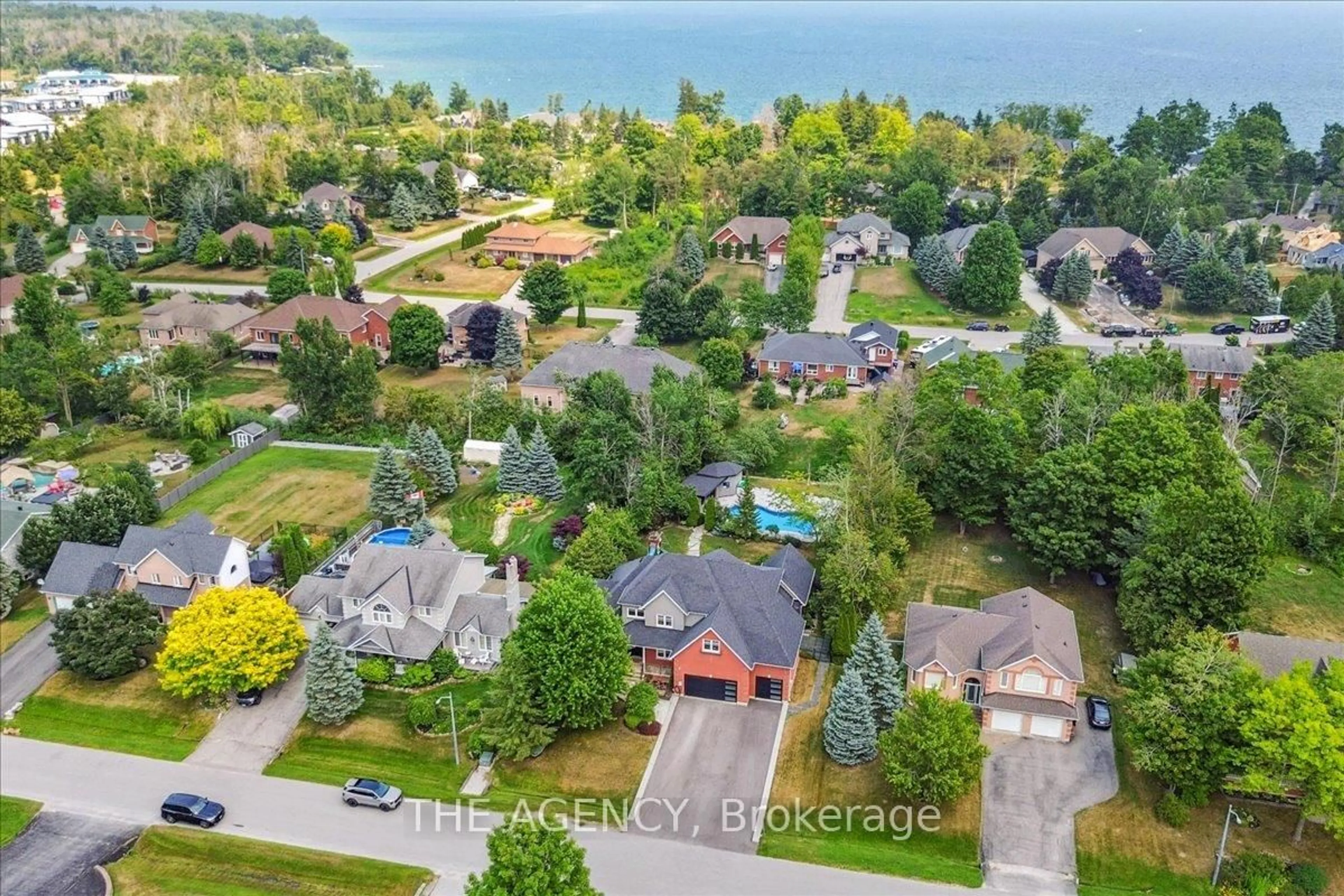 A pic from outside/outdoor area/front of a property/back of a property/a pic from drone, water/lake/river/ocean view for 3655 Kimberley St, Innisfil Ontario L9S 2L3