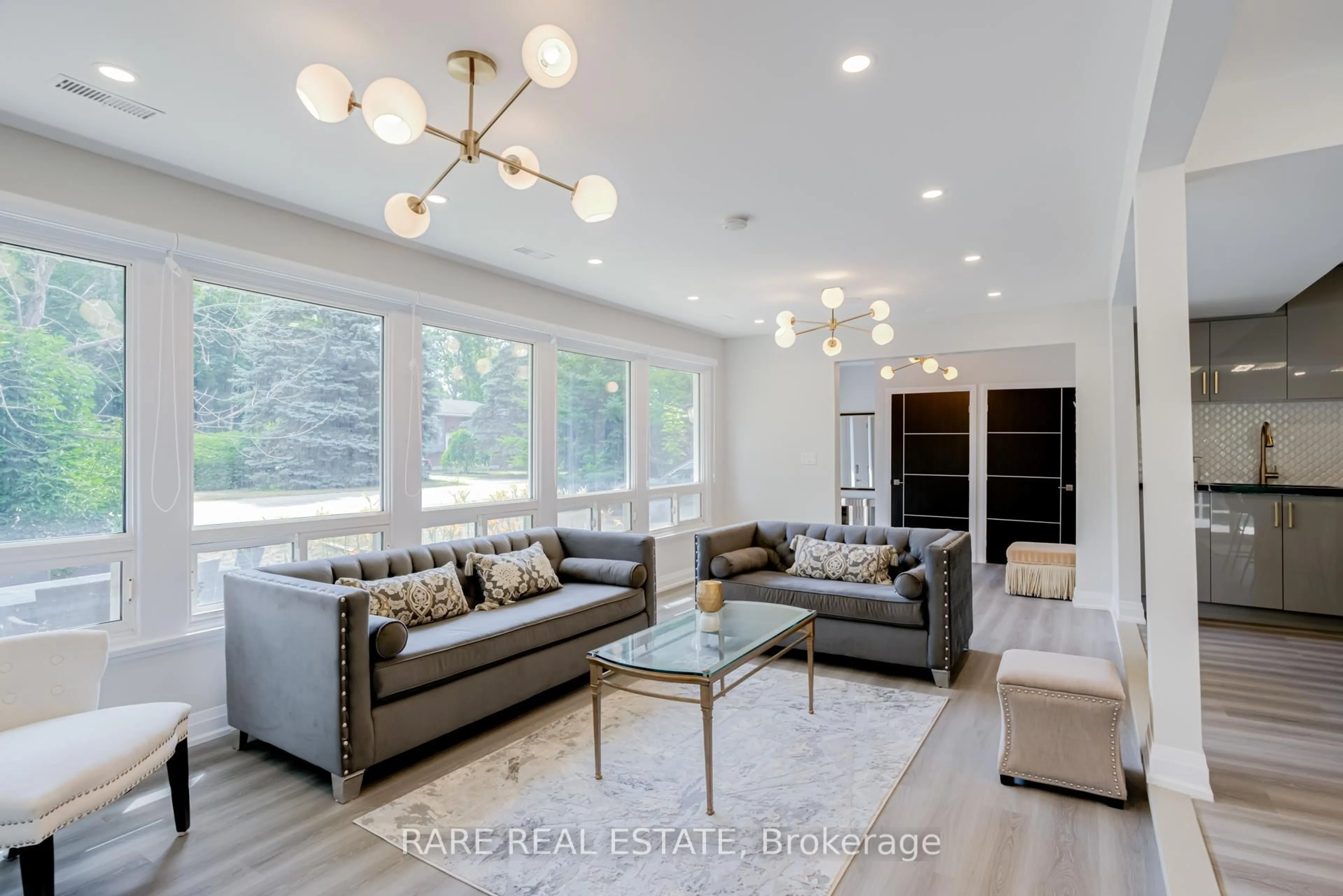 Living room with furniture, wood/laminate floor for 3894 West St, Innisfil Ontario L9S 2L9