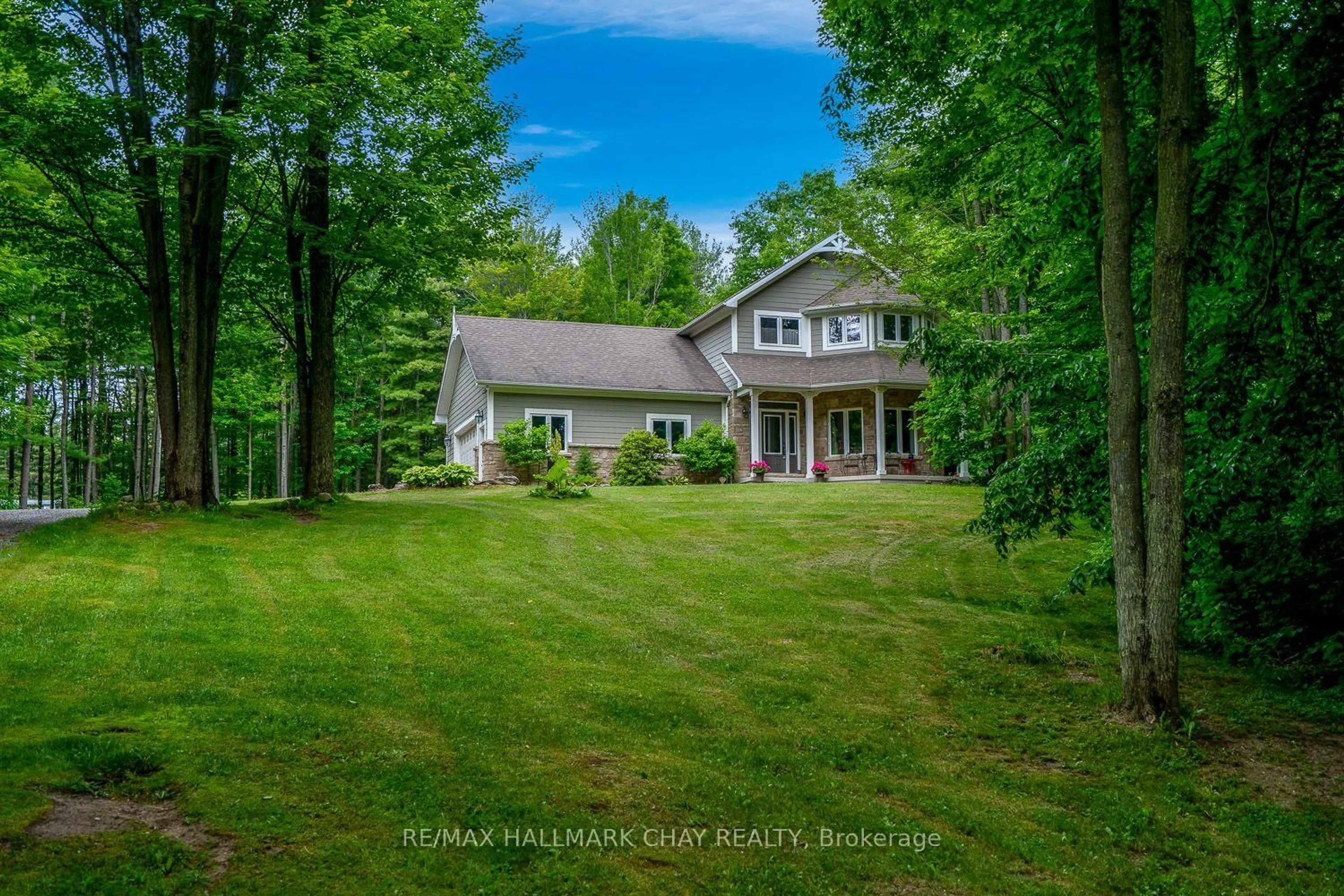 A pic from outside/outdoor area/front of a property/back of a property/a pic from drone, unknown for 34 Woodland Heights Dr, Adjala-Tosorontio Ontario L0M 1J0