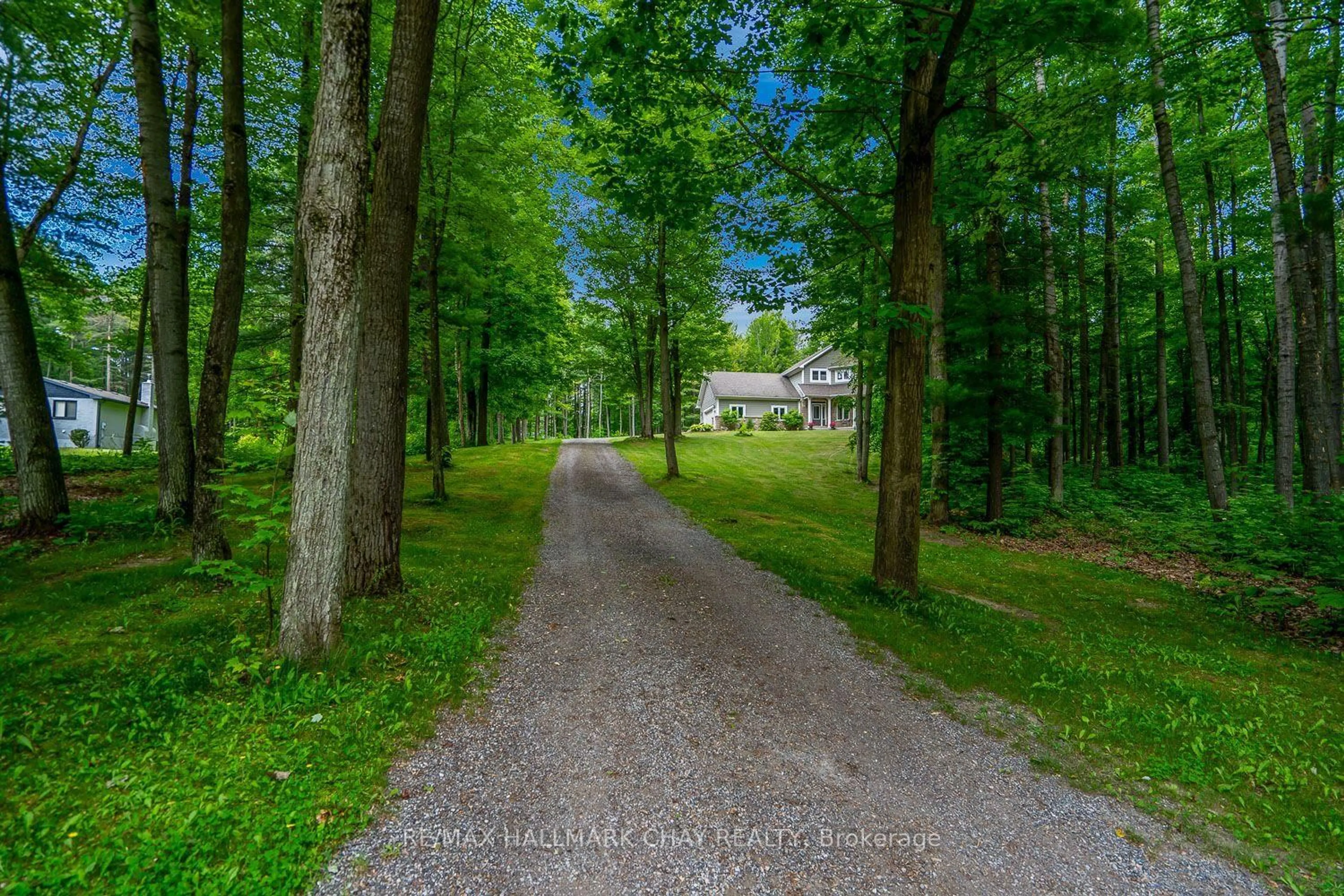 A pic from outside/outdoor area/front of a property/back of a property/a pic from drone, forest/trees view for 34 Woodland Heights Dr, Adjala-Tosorontio Ontario L0M 1J0