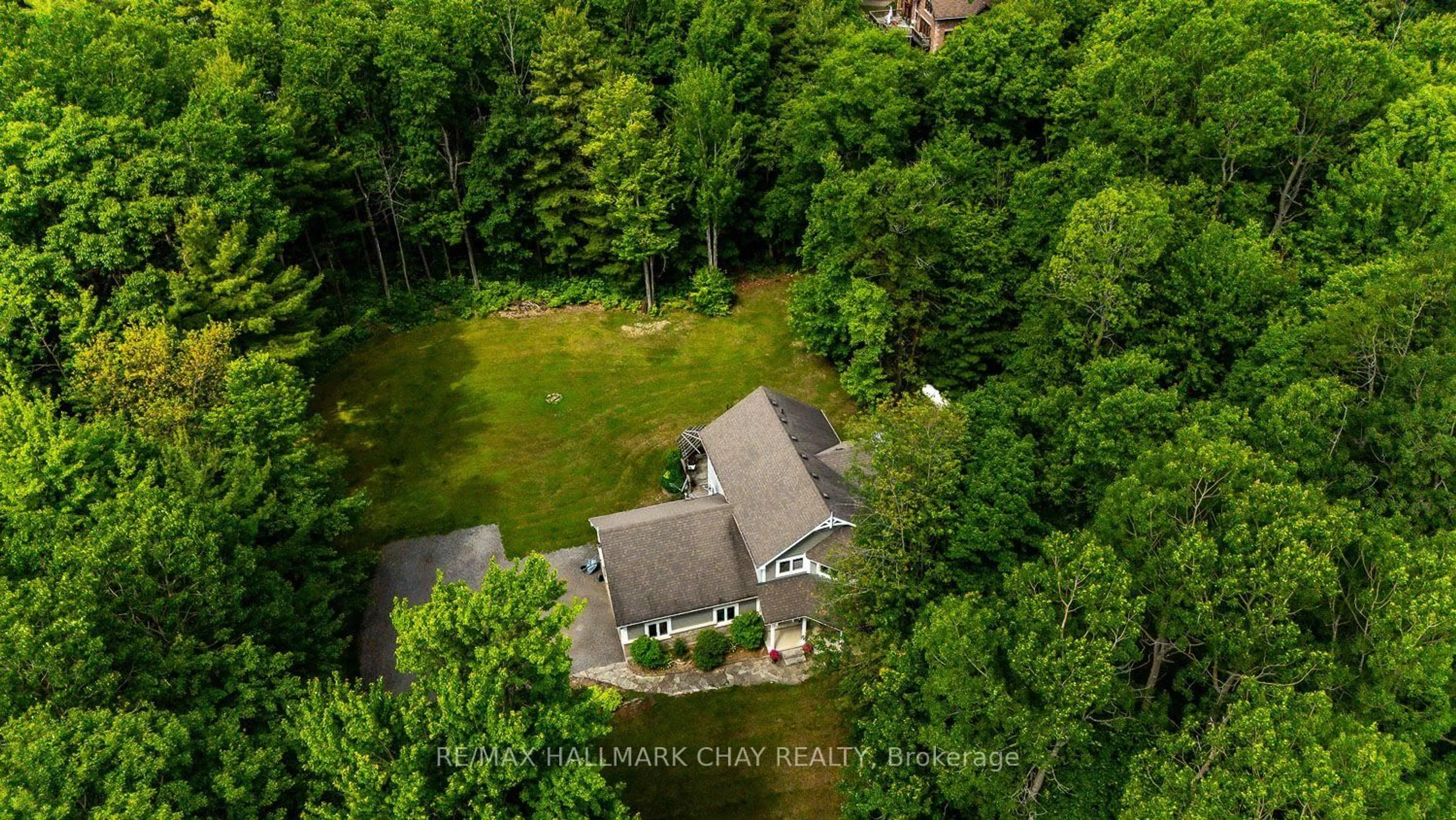 A pic from outside/outdoor area/front of a property/back of a property/a pic from drone, unknown for 34 Woodland Heights Dr, Adjala-Tosorontio Ontario L0M 1J0