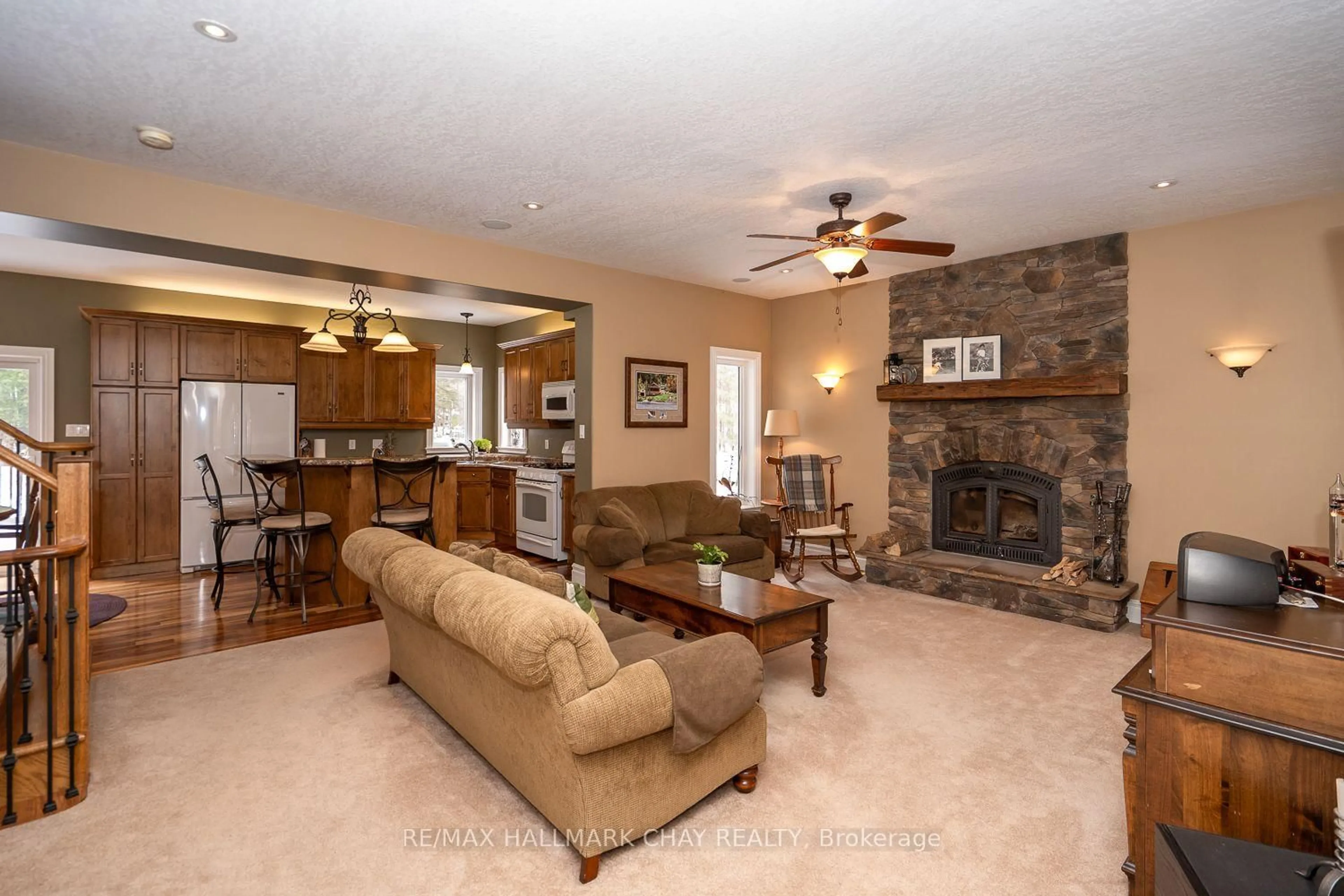 Living room with furniture, ceramic/tile floor for 34 Woodland Heights Dr, Adjala-Tosorontio Ontario L0M 1J0