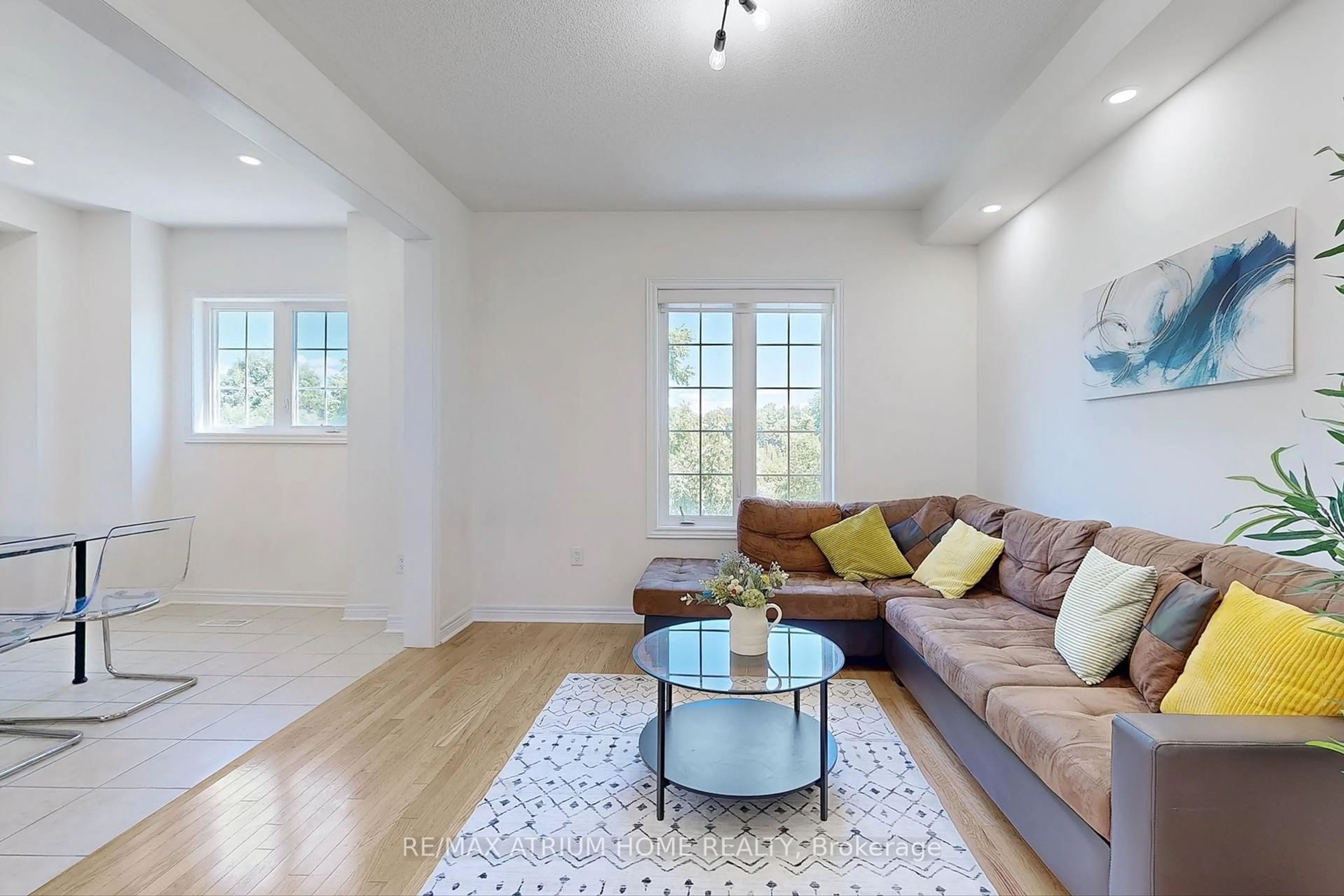 Living room with furniture, wood/laminate floor for 15 Old Colony Rd #99, Richmond Hill Ontario L4E 4L4