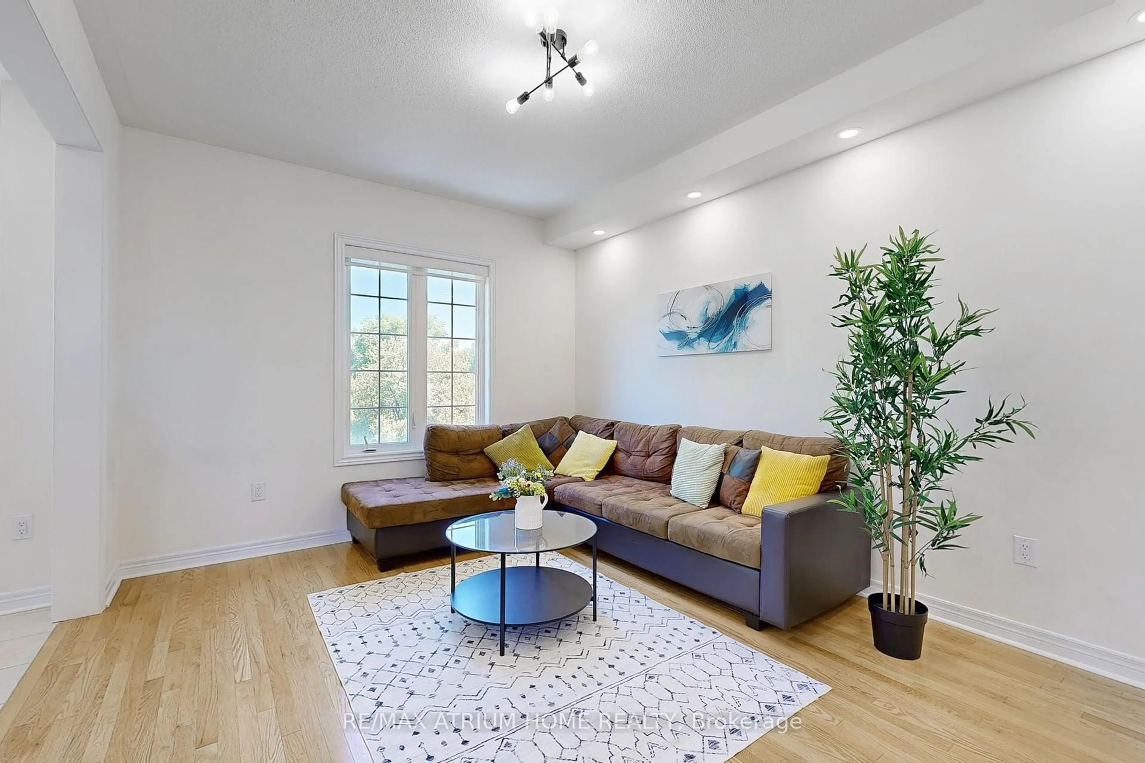 Living room with furniture, wood/laminate floor for 15 Old Colony Rd #99, Richmond Hill Ontario L4E 4L4