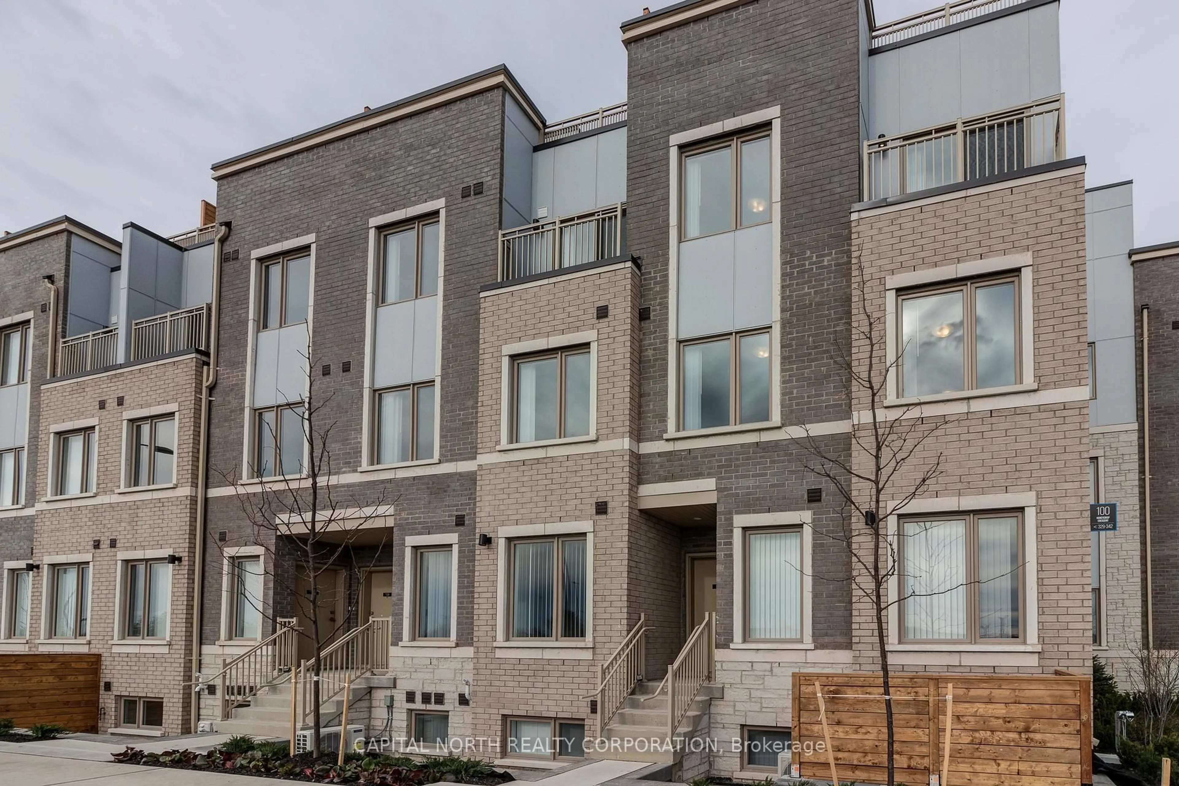 Home with brick exterior material, street for 100 Honeycrisp Cres #TH341, Vaughan Ontario L4K 5Z8