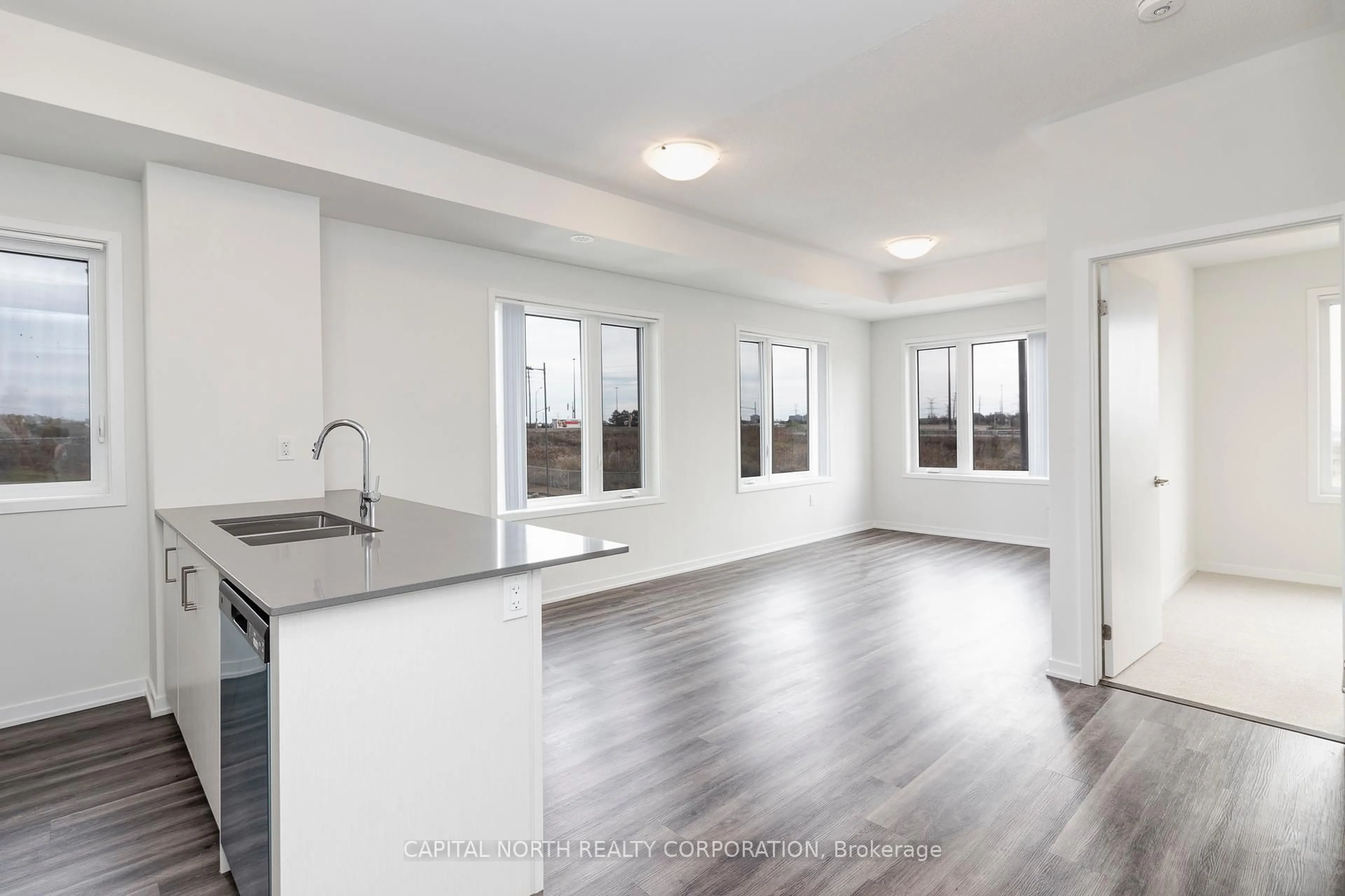 Open concept kitchen, unknown for 100 Honeycrisp Cres #TH341, Vaughan Ontario L4K 5Z8