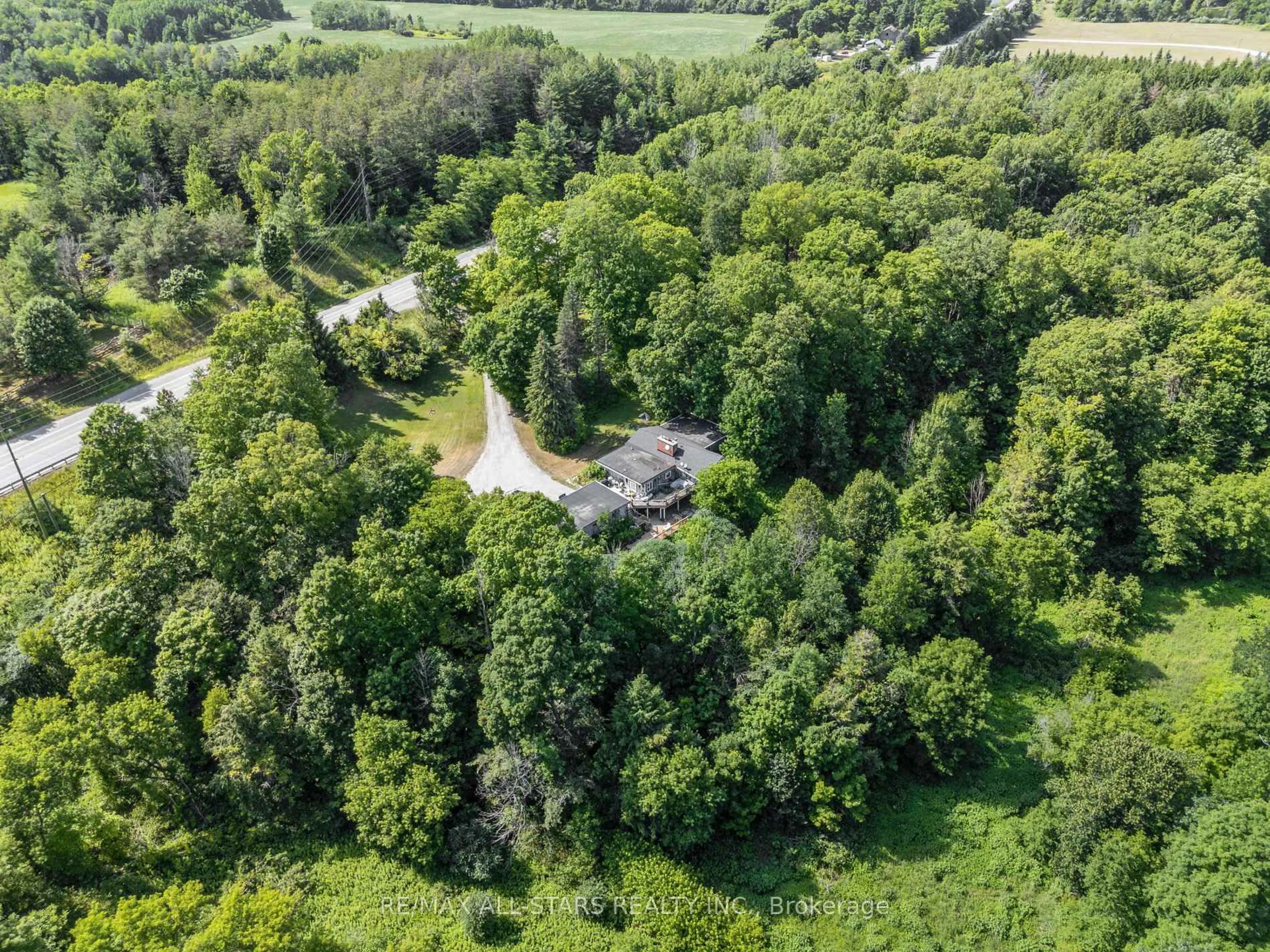 A pic from outside/outdoor area/front of a property/back of a property/a pic from drone, forest/trees view for 4819 Regional Rd 30 Rd, Uxbridge Ontario L9P 0J6