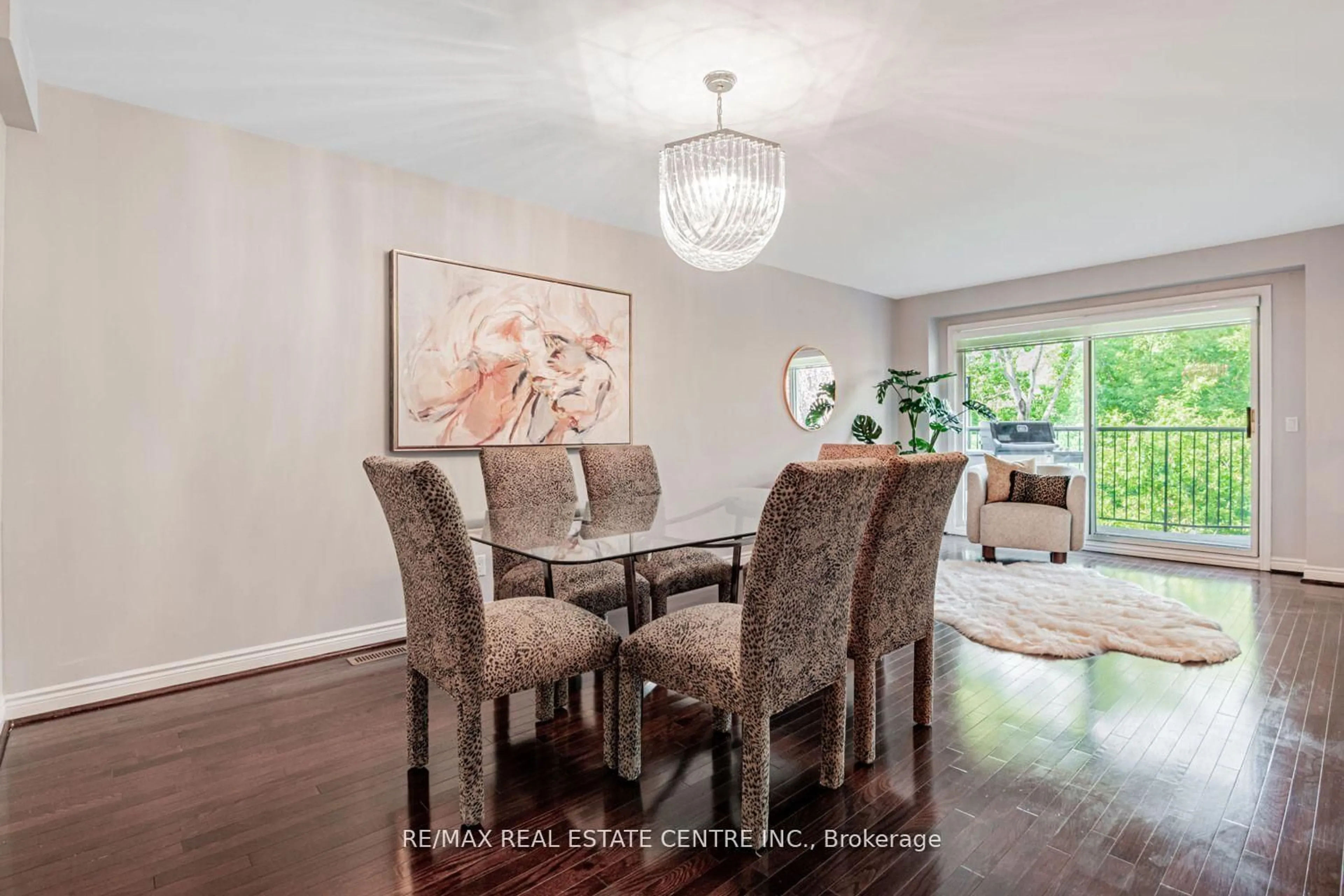 Dining room, wood/laminate floor for 15 Rockingham Crt, Markham Ontario L3T 7R8