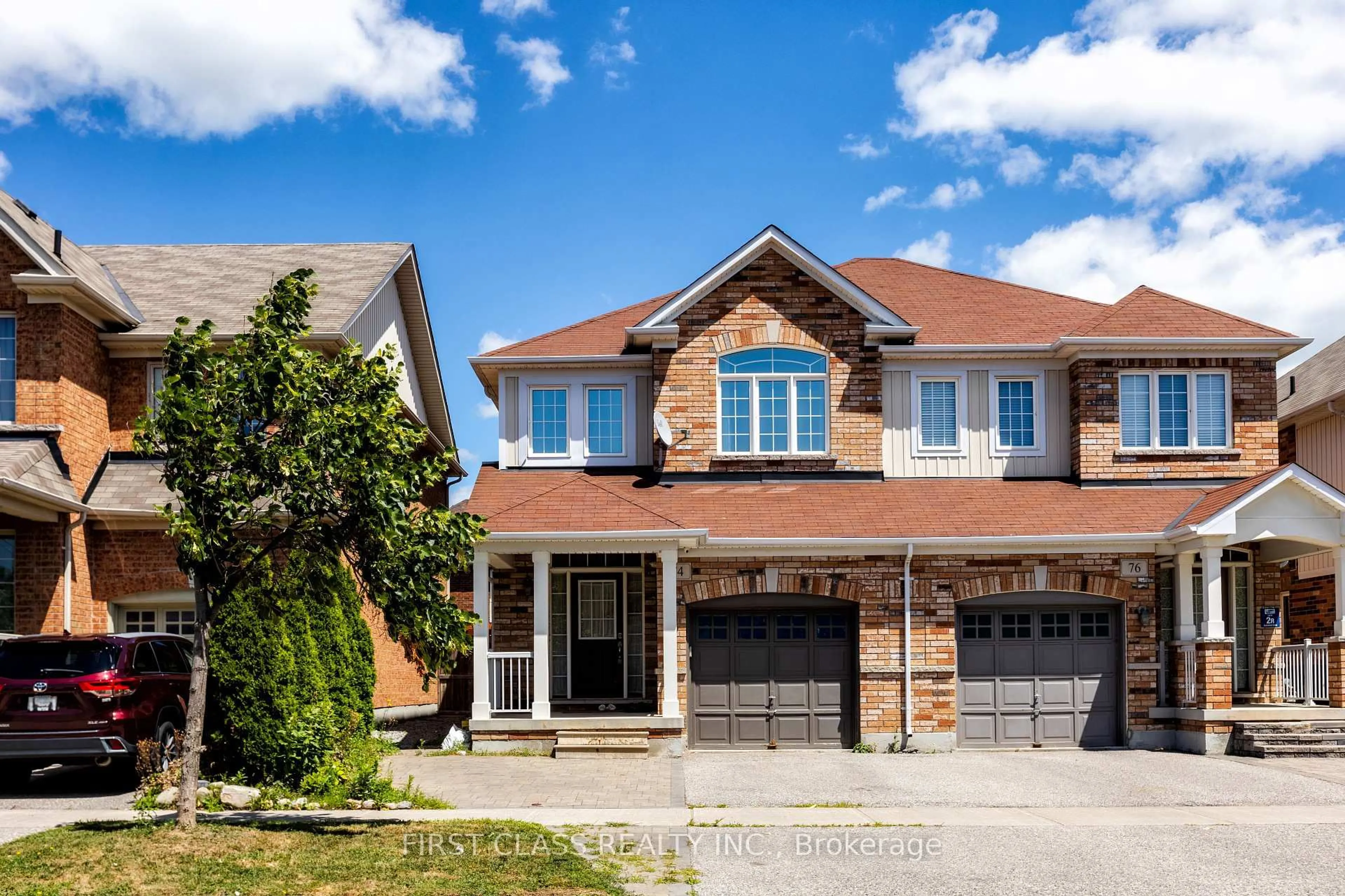 Home with brick exterior material, street for 74 Evershot Cres, Markham Ontario L6E 0L7