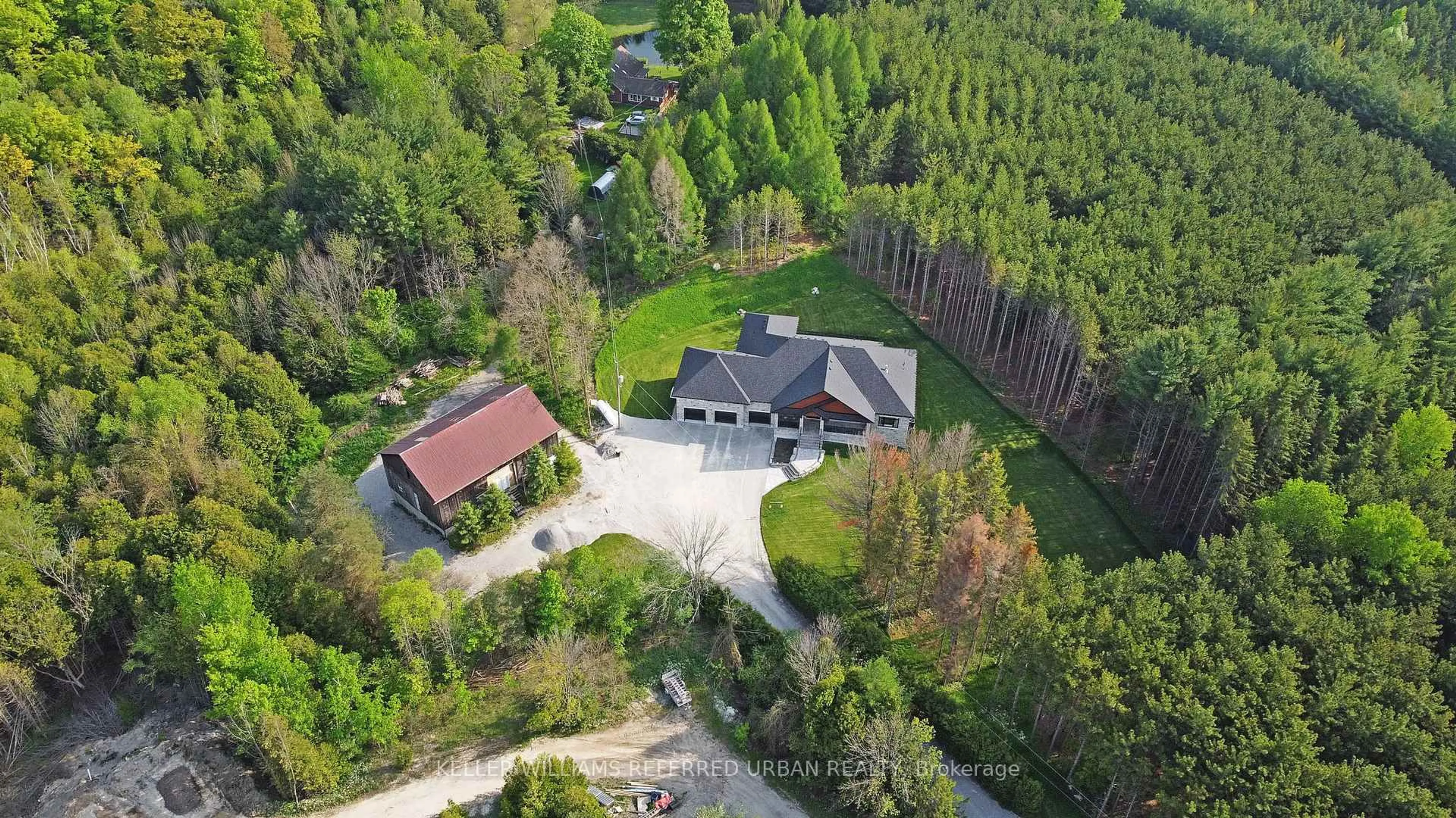 A pic from outside/outdoor area/front of a property/back of a property/a pic from drone, forest/trees view for 2705 14th Line, Innisfil Ontario L0L 1R0