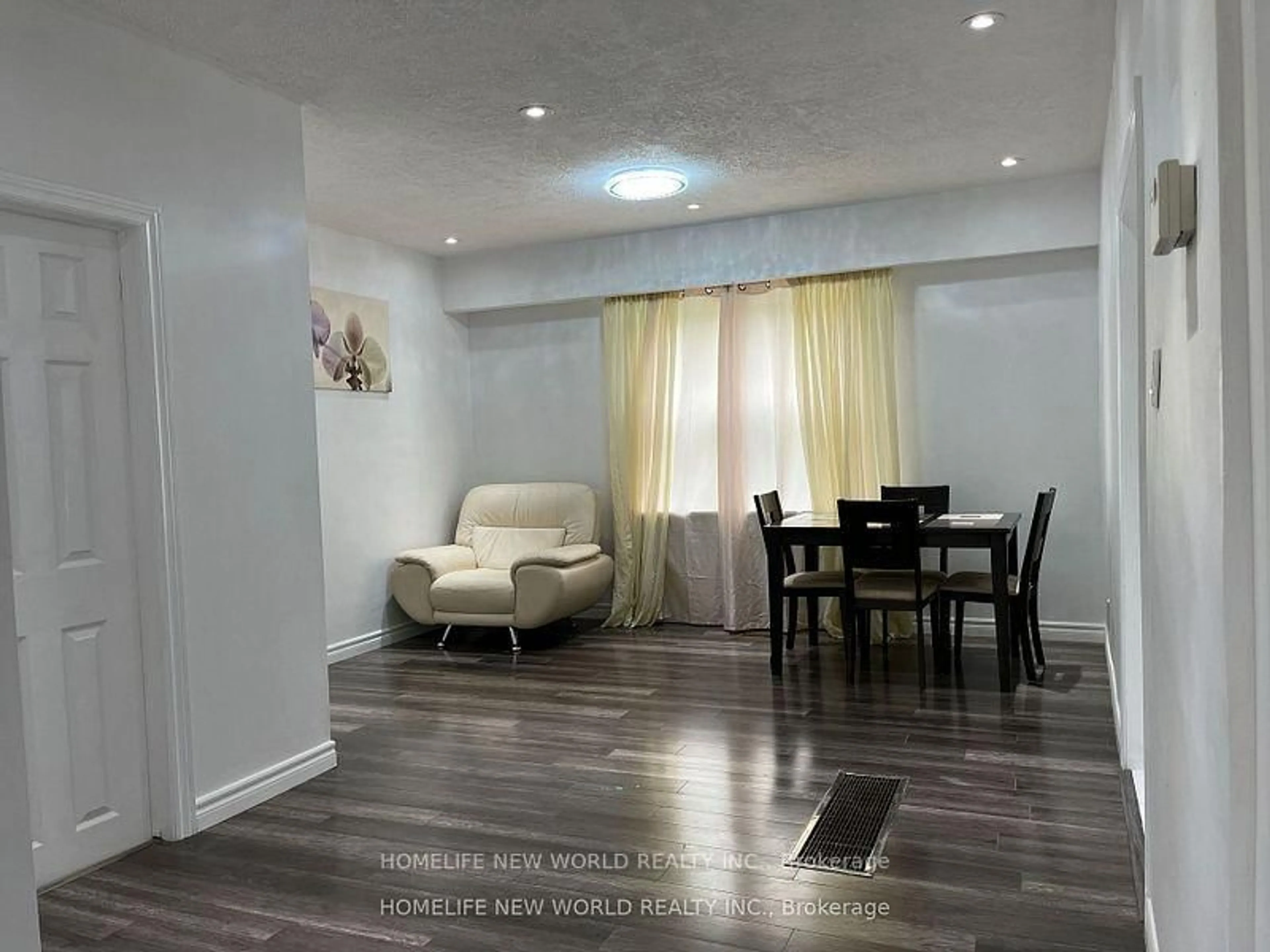Living room with furniture, wood/laminate floor for 4549 14th Ave, Markham Ontario L3S 3K2