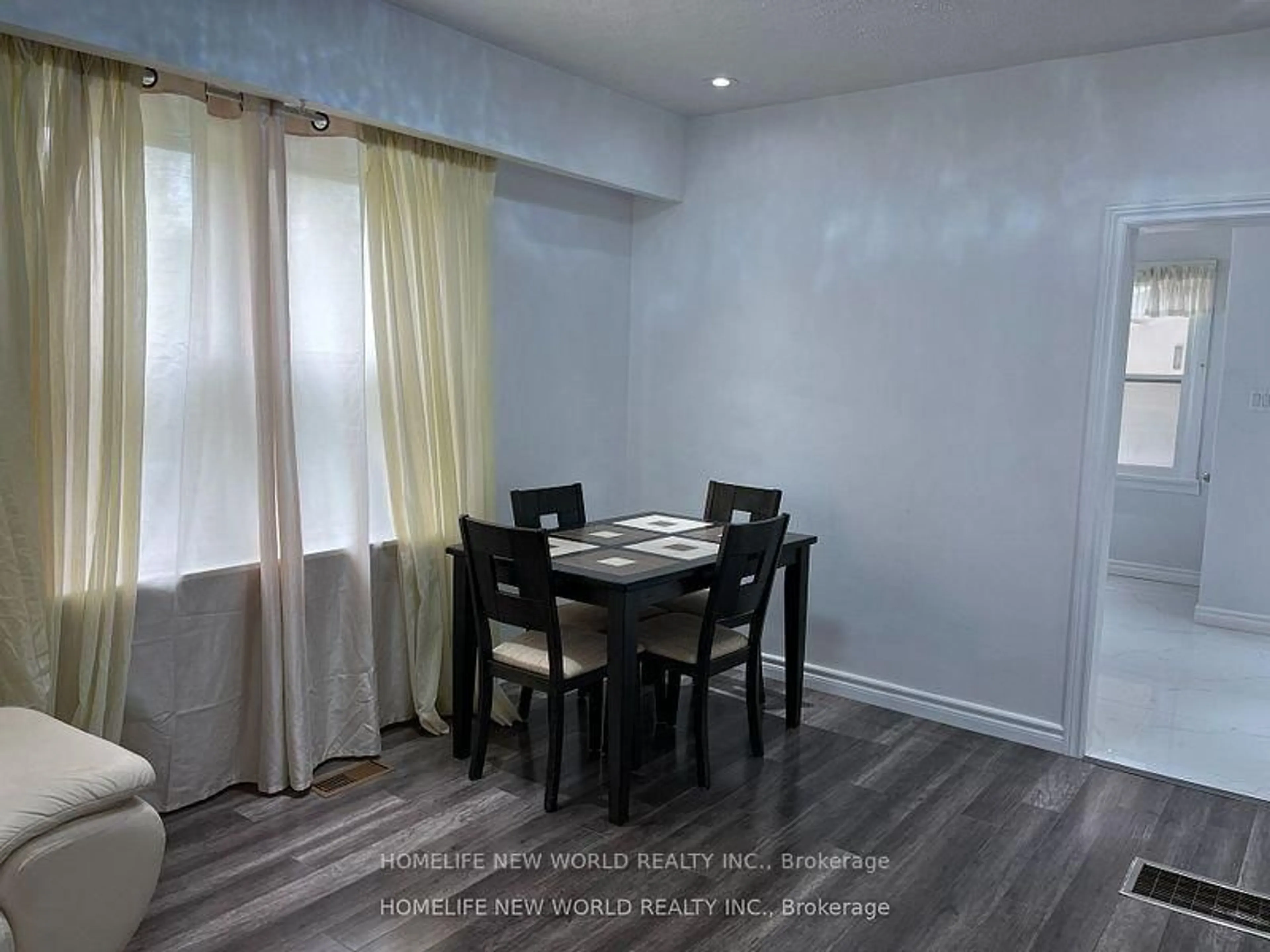 Dining room, wood/laminate floor for 4549 14th Ave, Markham Ontario L3S 3K2