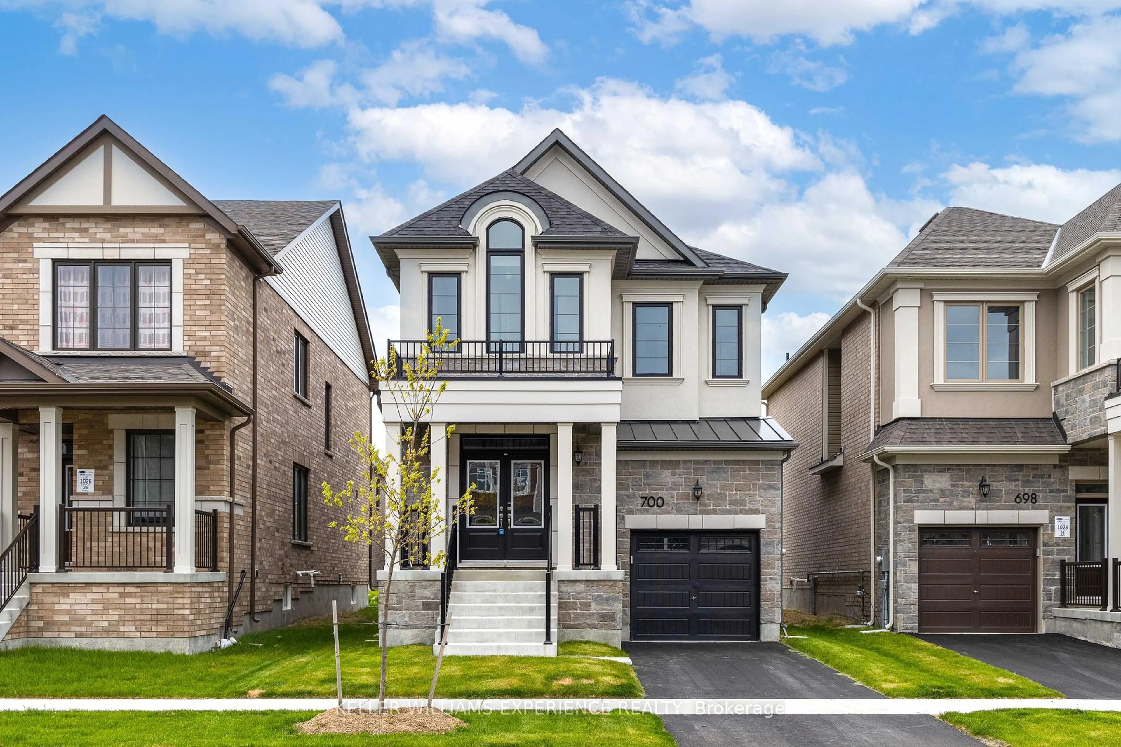 Home with brick exterior material, street for 700 Mika St, Innisfil Ontario L9S 0R7