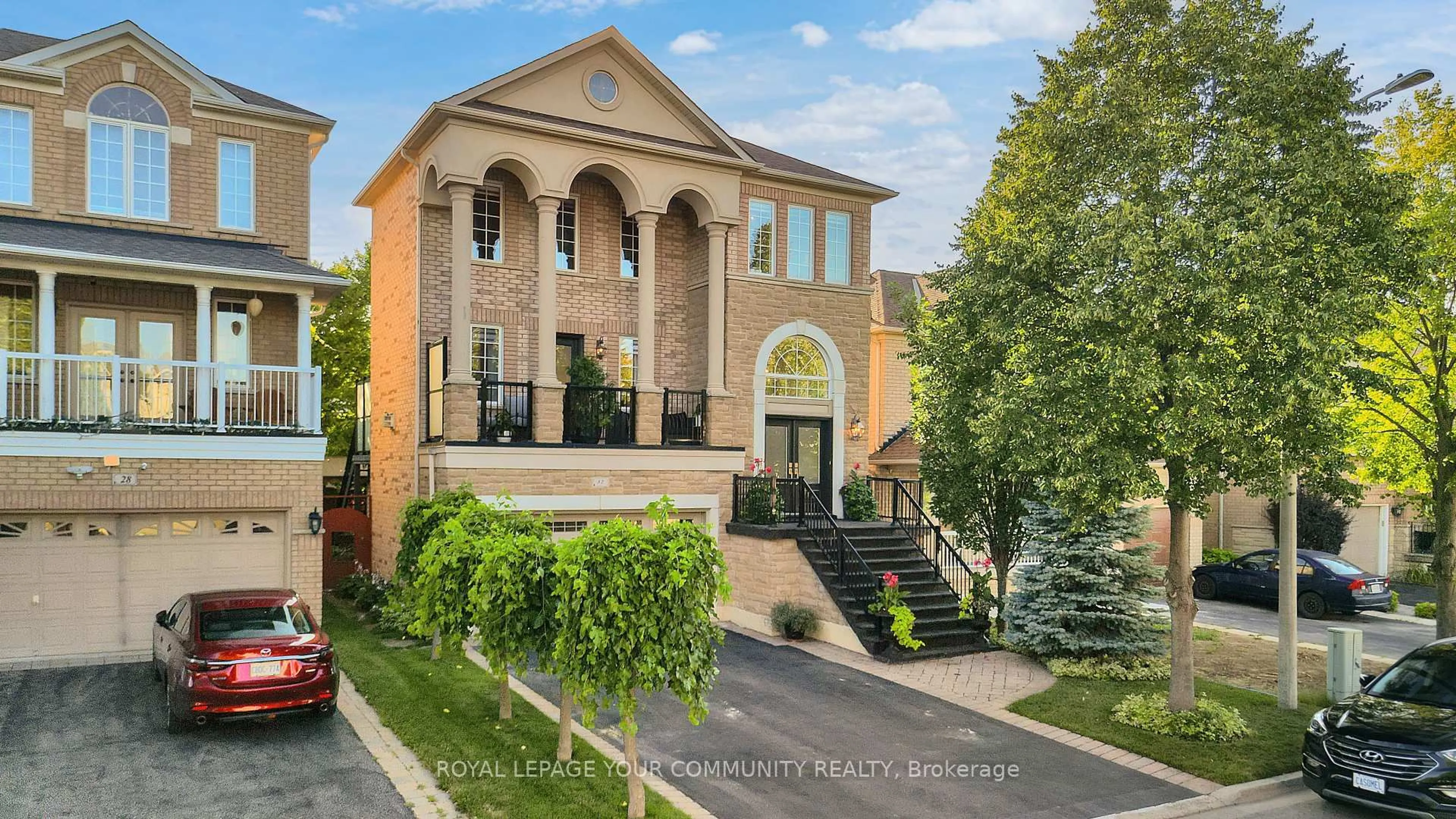 Home with brick exterior material, street for 32 Wheatfield Dr, Vaughan Ontario L4H 2K7
