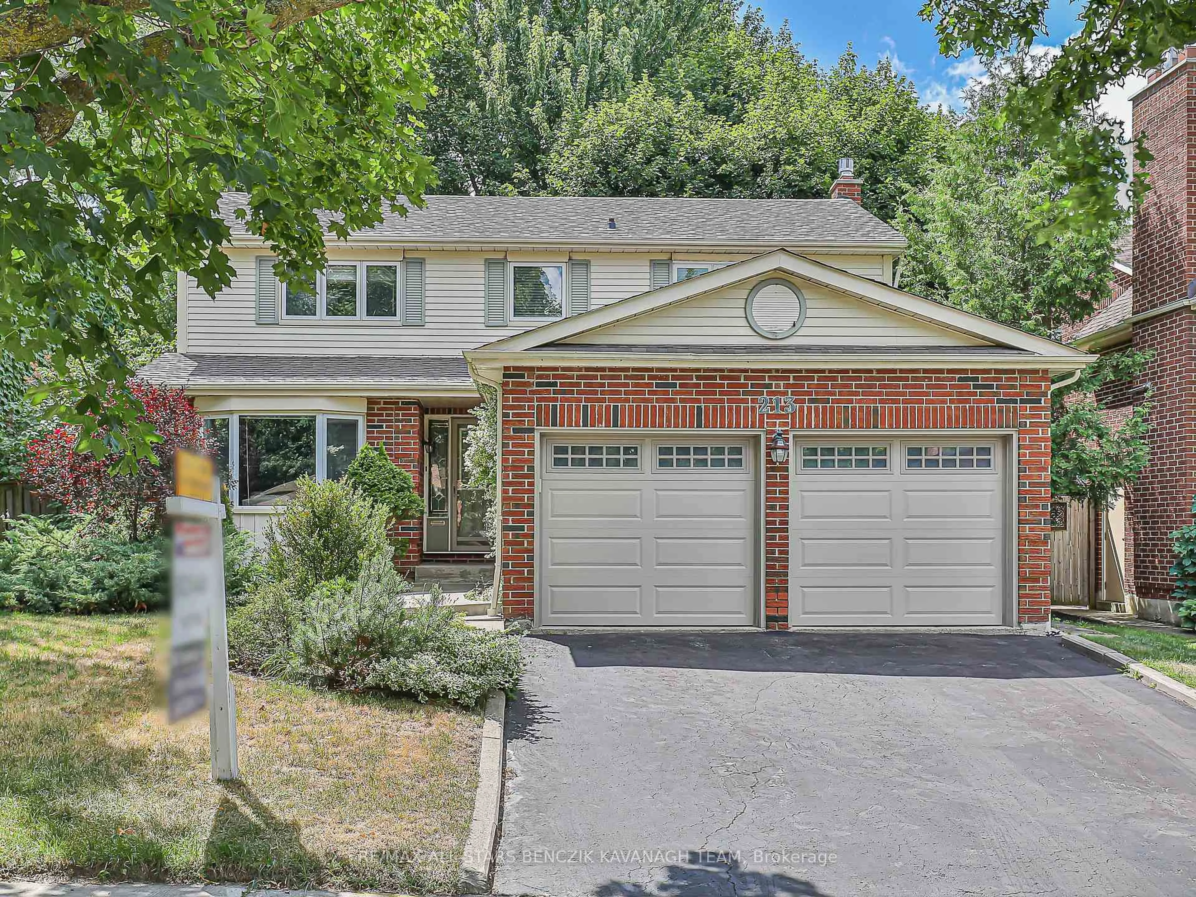 Home with brick exterior material, street for 213 Fincham Ave, Markham Ontario L3P 4B4