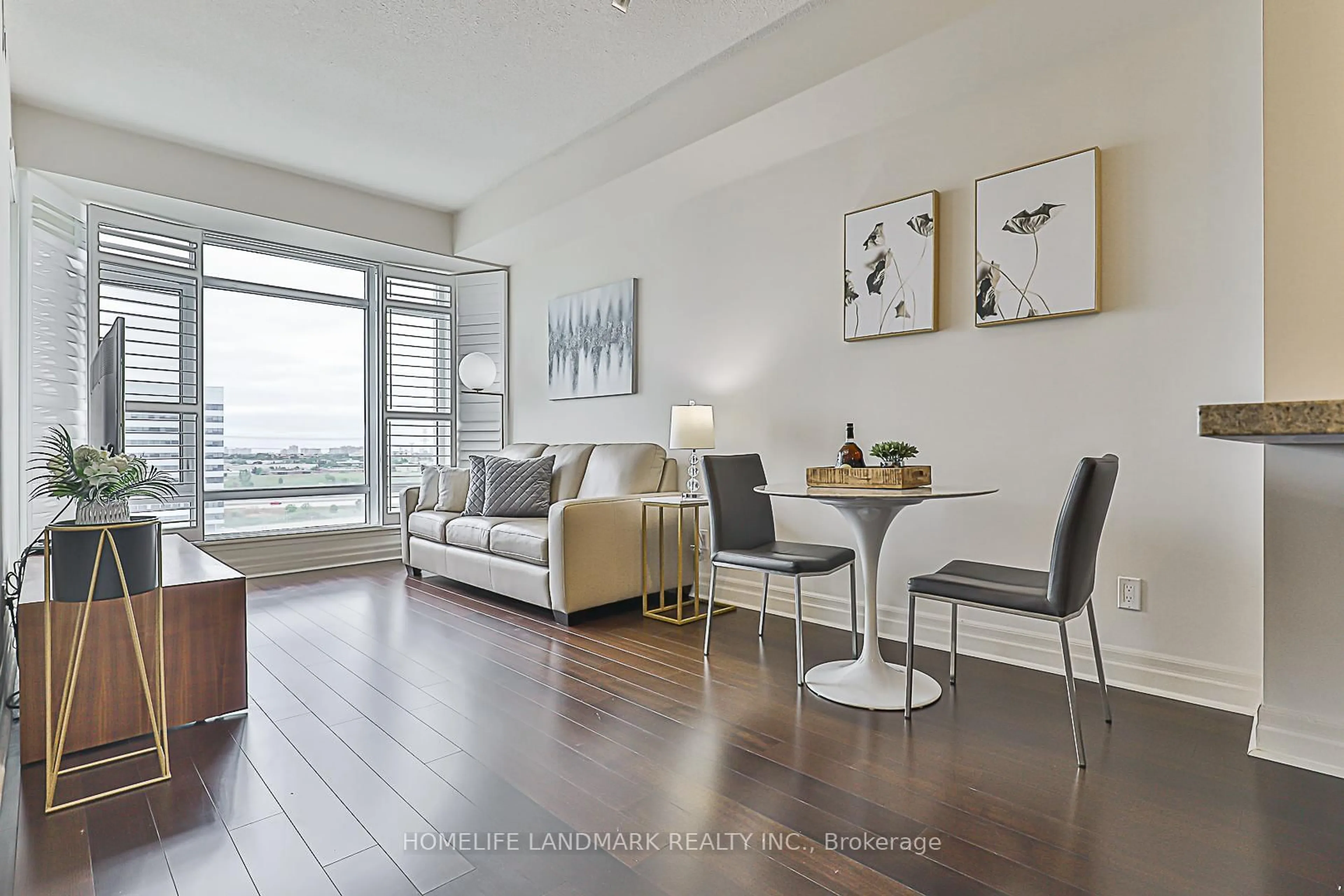 Living room with furniture, wood/laminate floor for 8110 Birchmount Rd #1102, Markham Ontario L6G 0E3