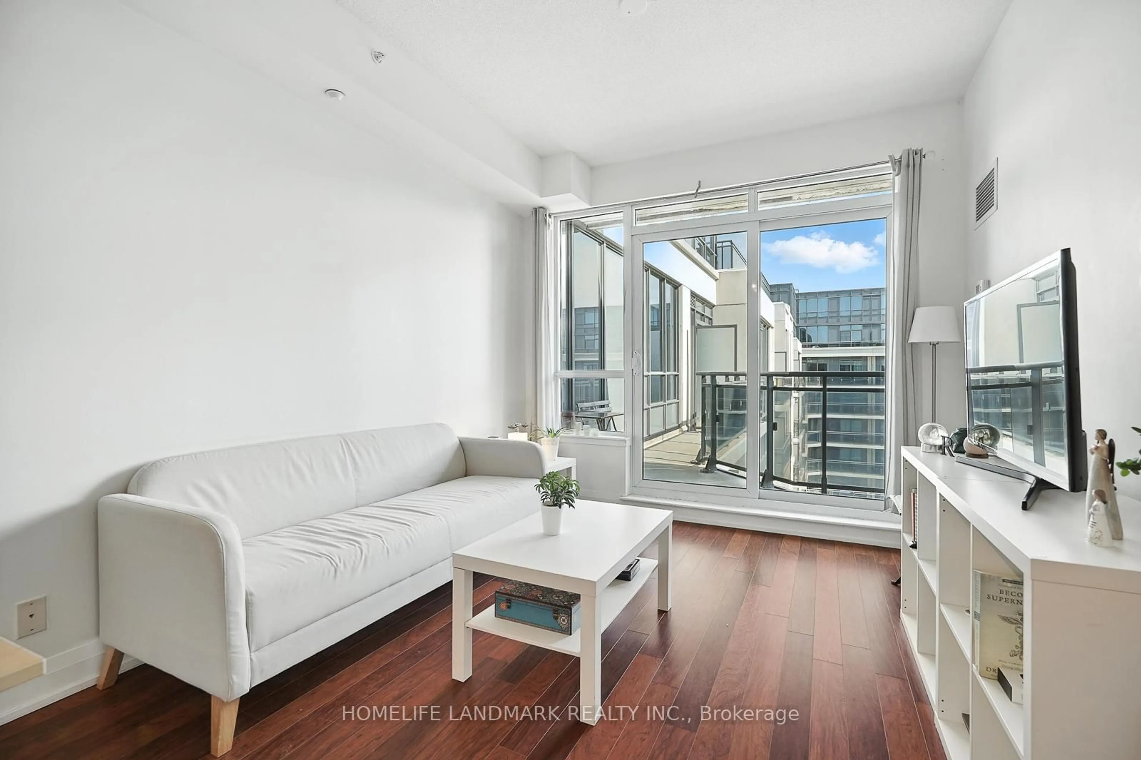 Living room with furniture, wood/laminate floor for 376 HIGHWAY 7 #1009, Richmond Hill Ontario L4B 0C7