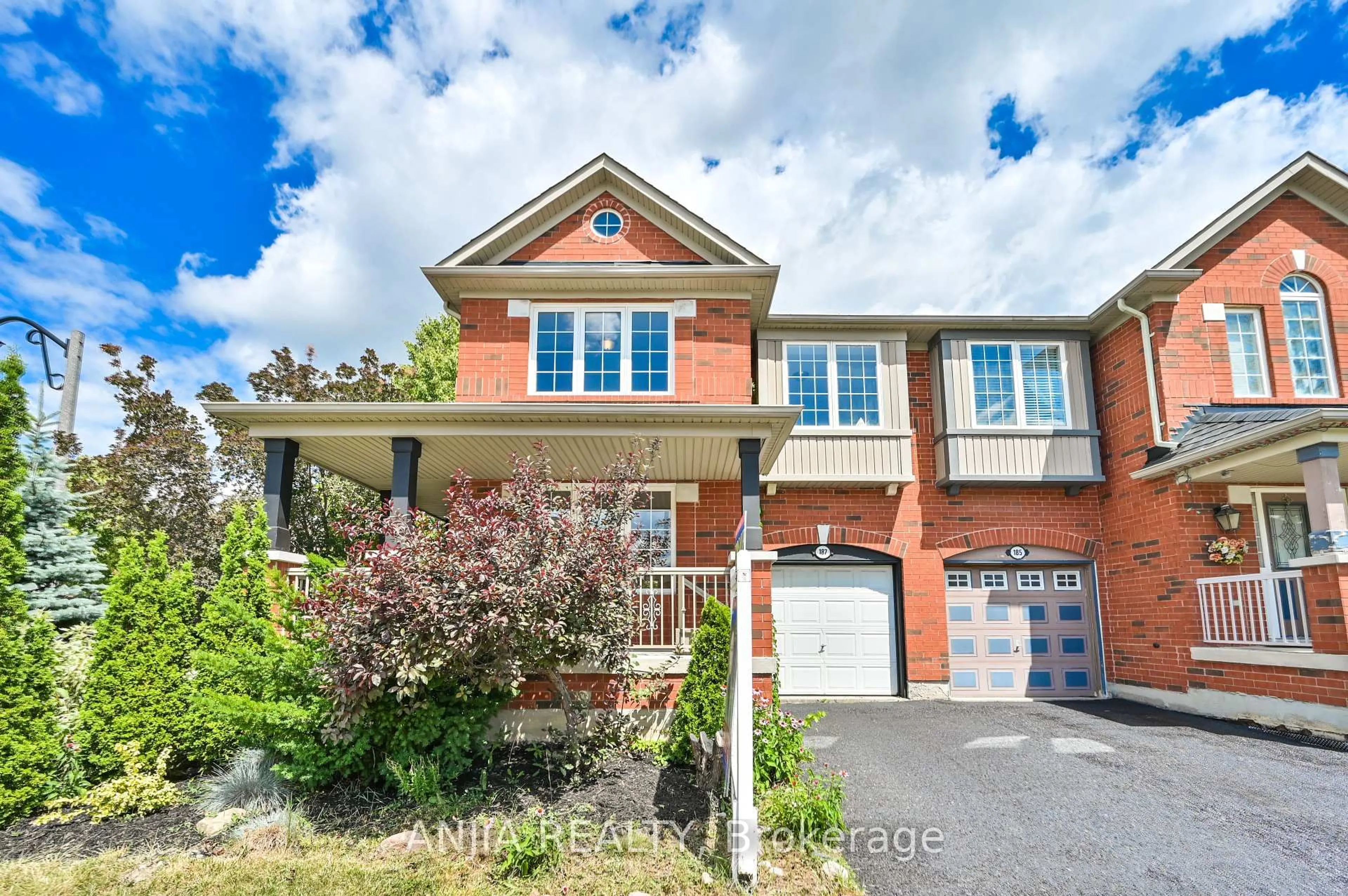 Home with brick exterior material, street for 187 Roy Rainey Ave, Markham Ontario L6E 1G6