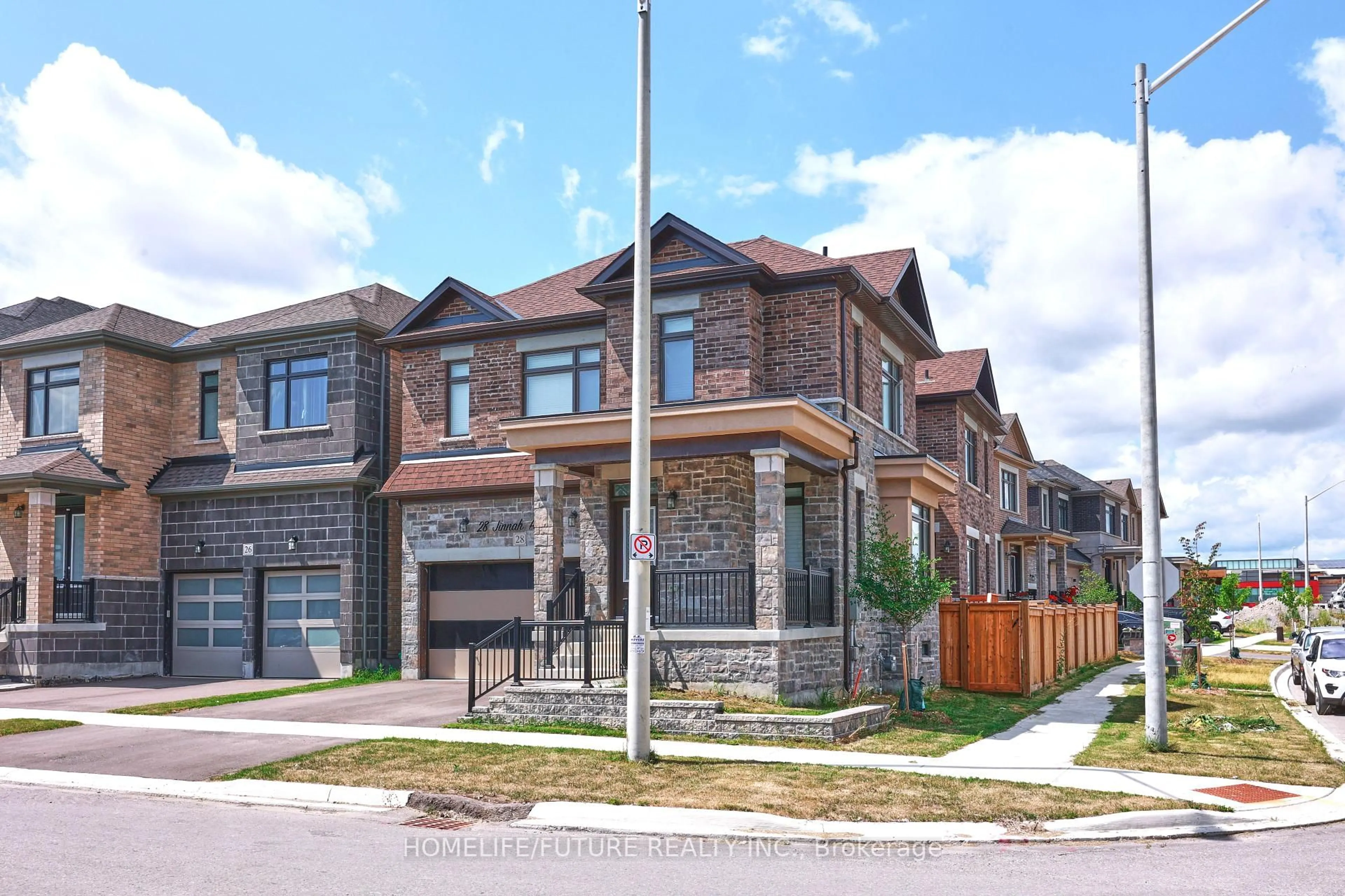 Home with brick exterior material, street for 28 Jinnah Ave, Markham Ontario L3S 0G2