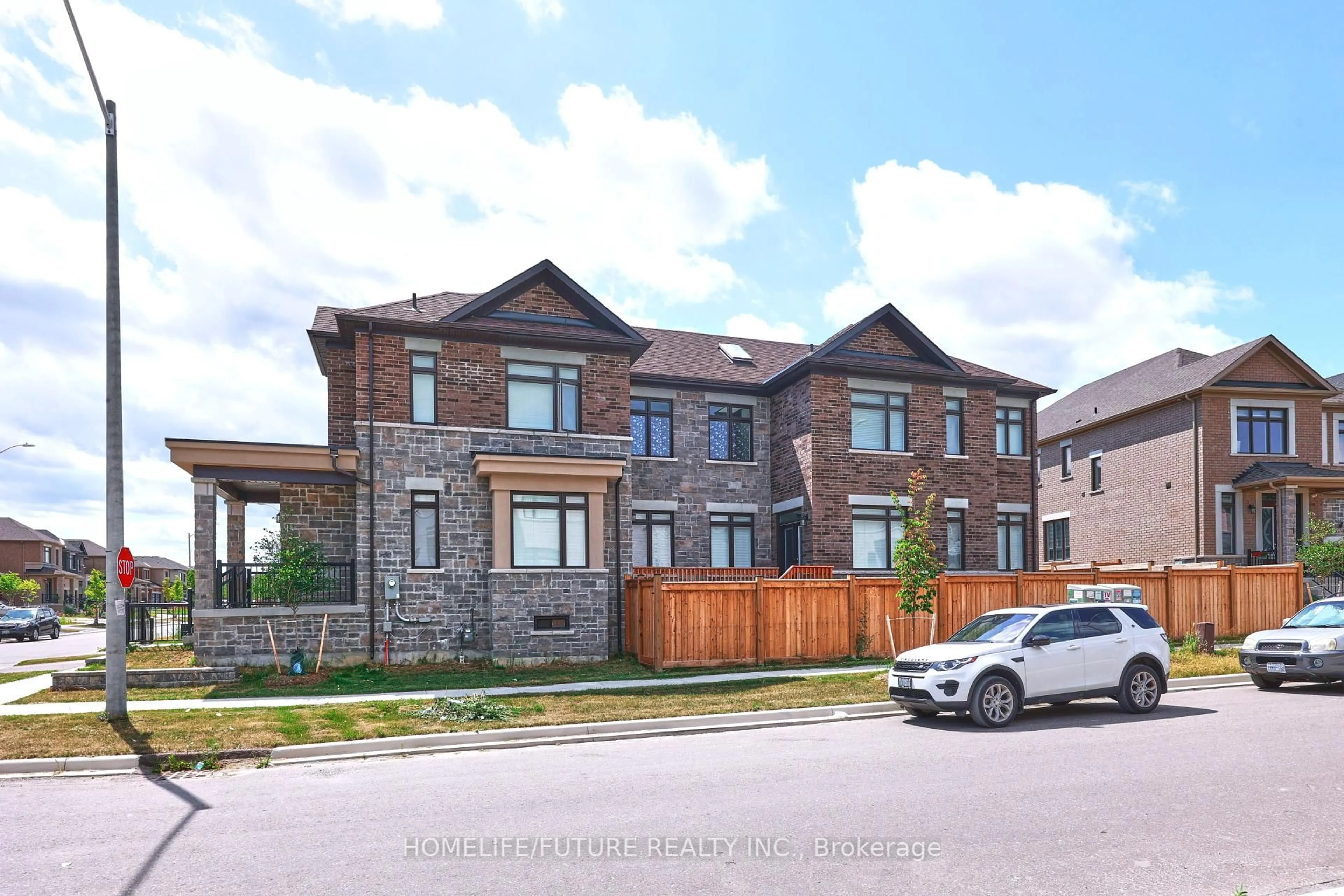 Home with brick exterior material, street for 28 Jinnah Ave, Markham Ontario L3S 0G2