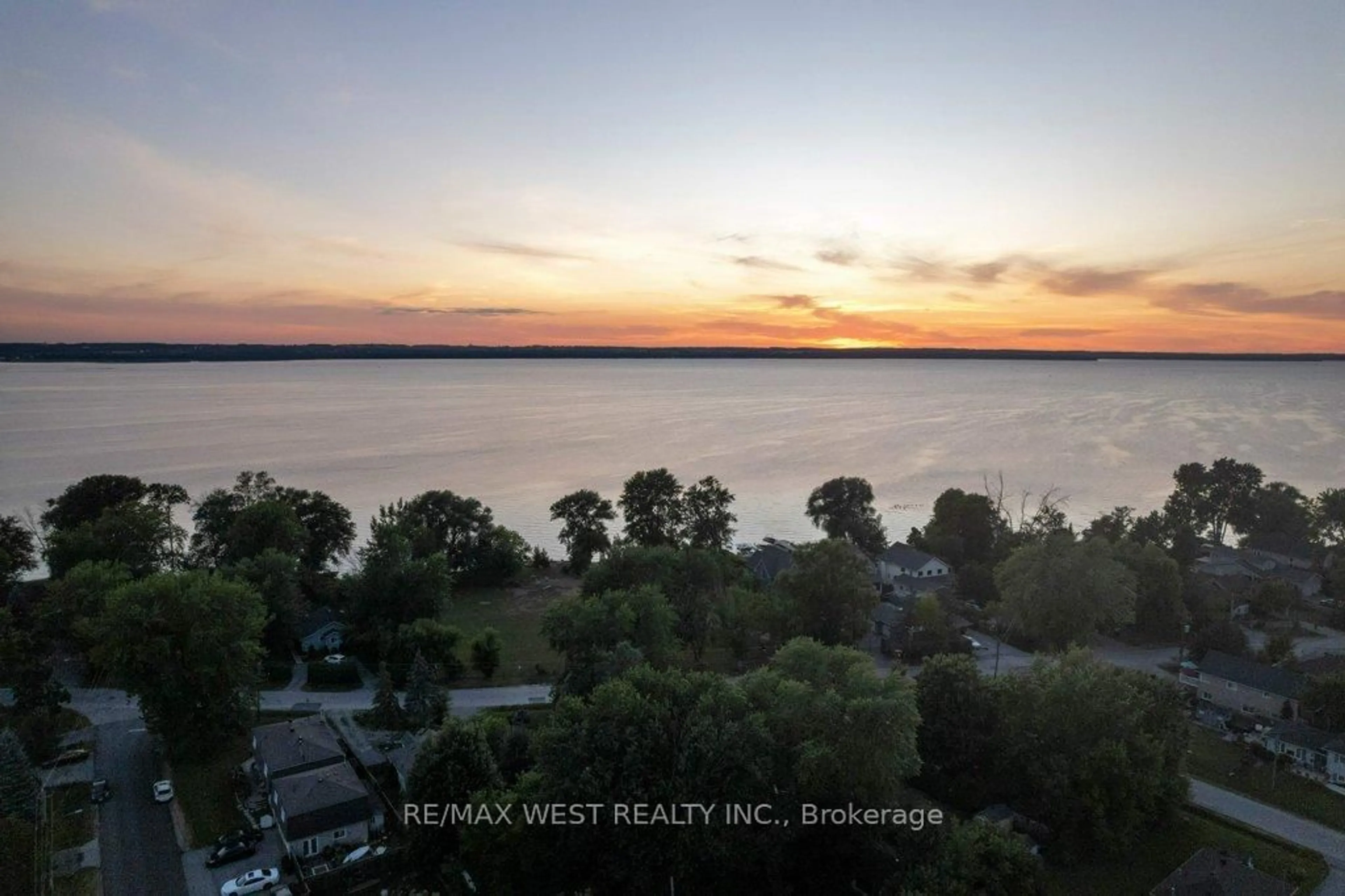 A pic from outside/outdoor area/front of a property/back of a property/a pic from drone, water/lake/river/ocean view for 275 Pine Beach Dr, Georgina Ontario L4P 2V7