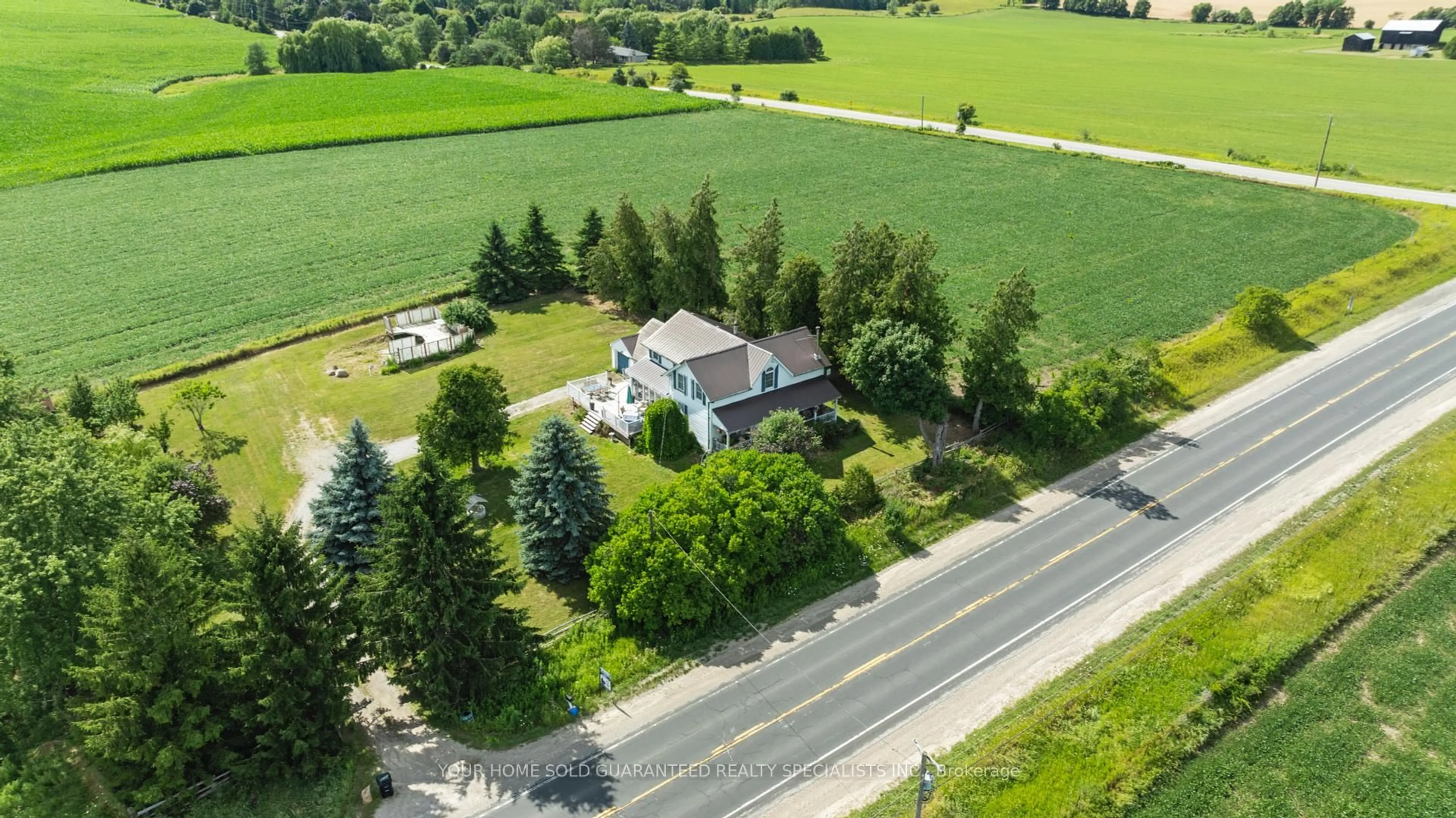 A pic from outside/outdoor area/front of a property/back of a property/a pic from drone, street for 3440 Highway 27, Bradford West Gwillimbury Ontario L3Z 3X1