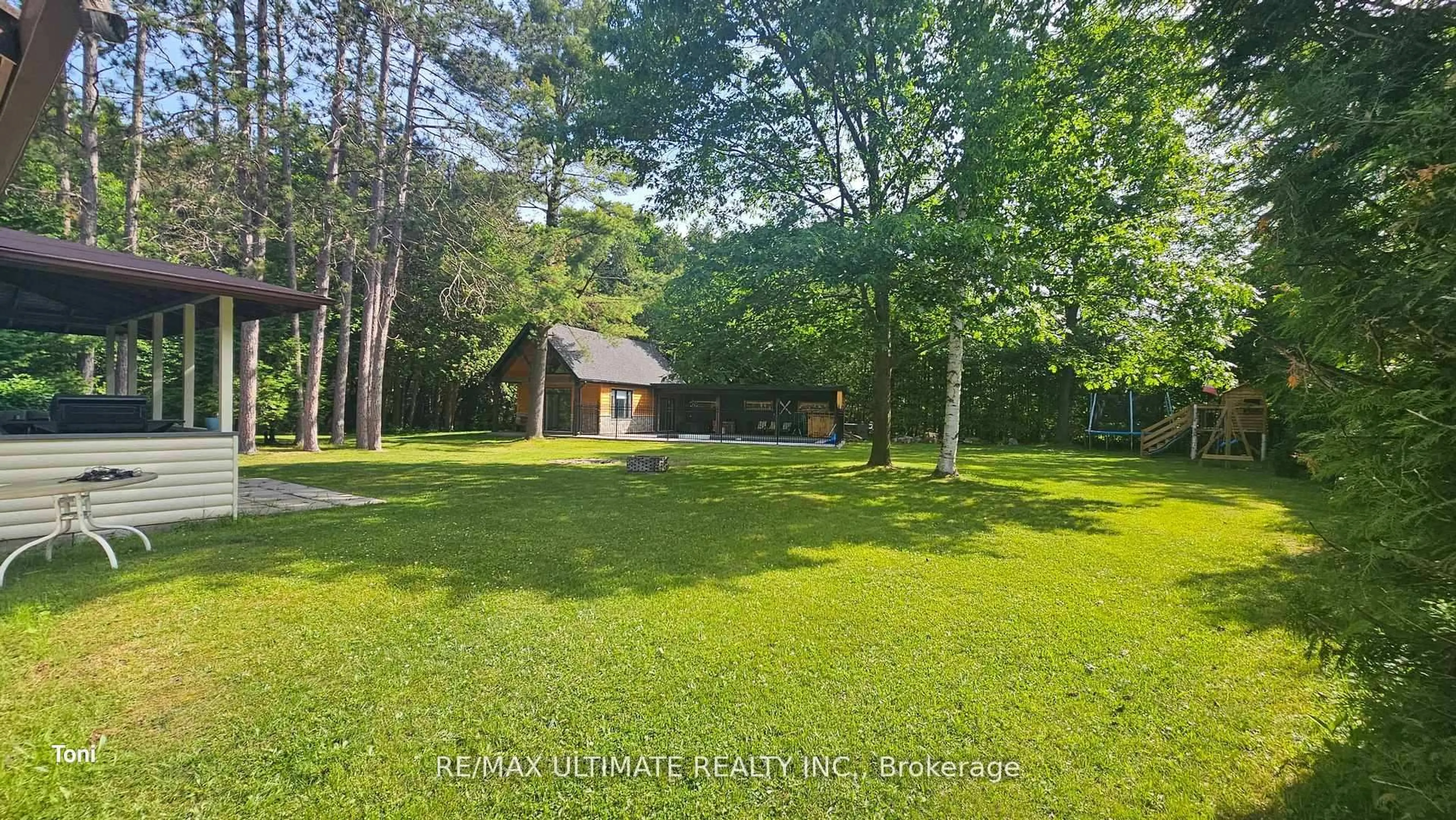 A pic from outside/outdoor area/front of a property/back of a property/a pic from drone, forest/trees view for 57 Linda Rd, Georgina Ontario L0C 1L0