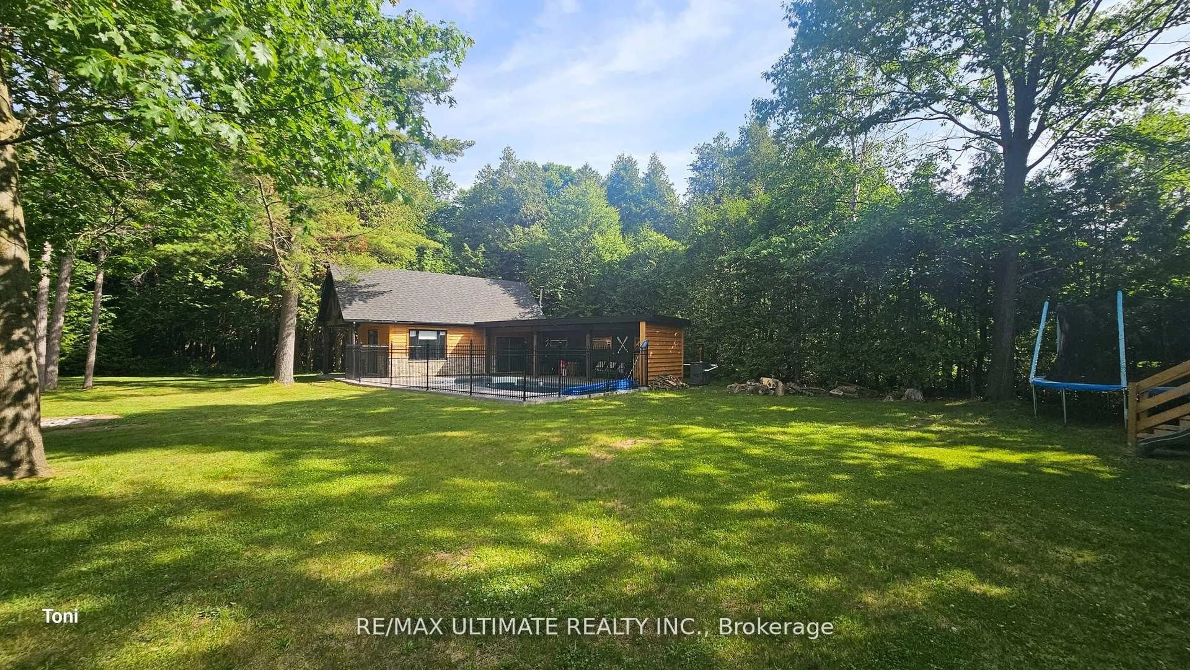 A pic from outside/outdoor area/front of a property/back of a property/a pic from drone, forest/trees view for 57 Linda Rd, Georgina Ontario L0C 1L0