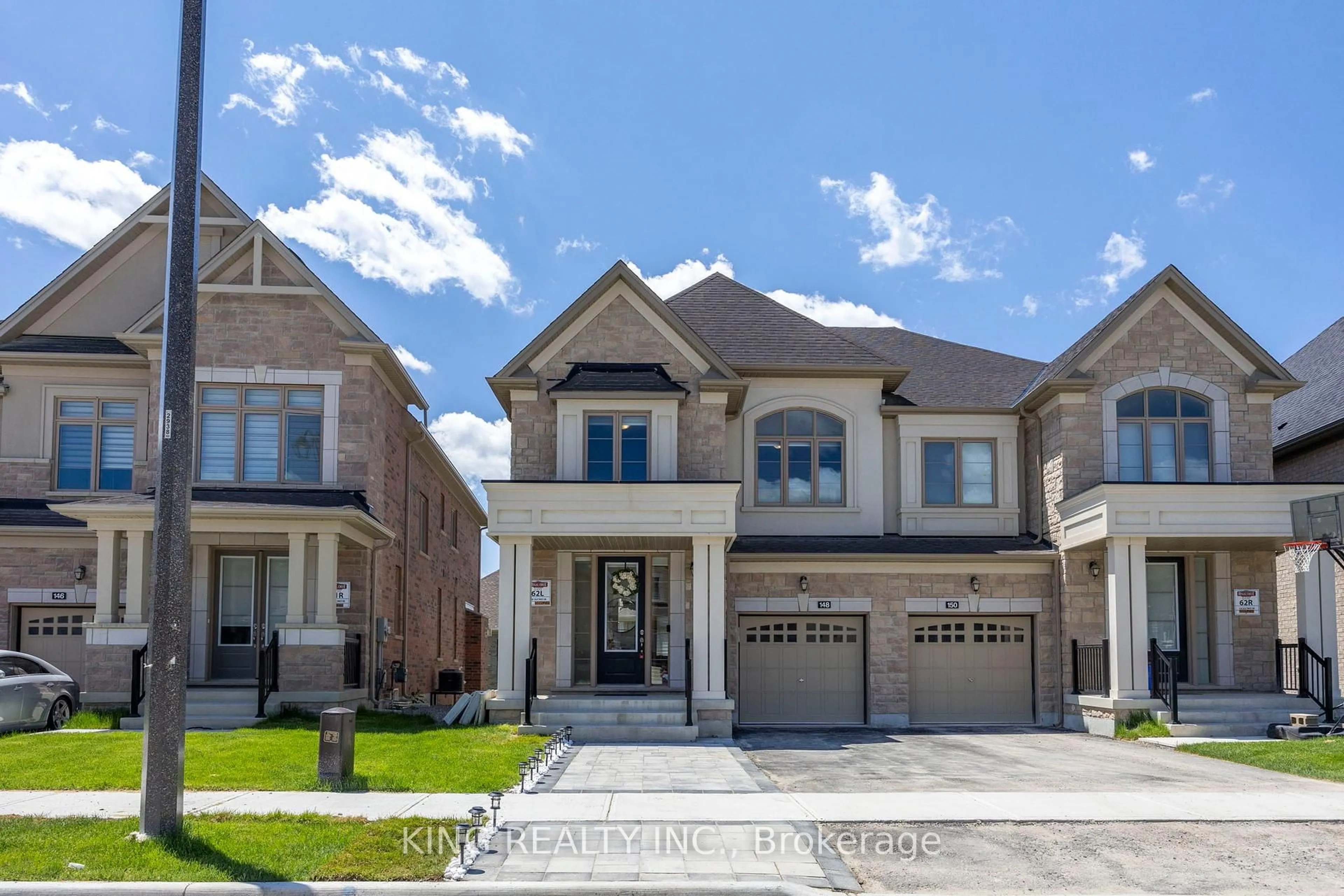 Home with brick exterior material, street for 148 Silk Twist Dr, East Gwillimbury Ontario L9N 0V7
