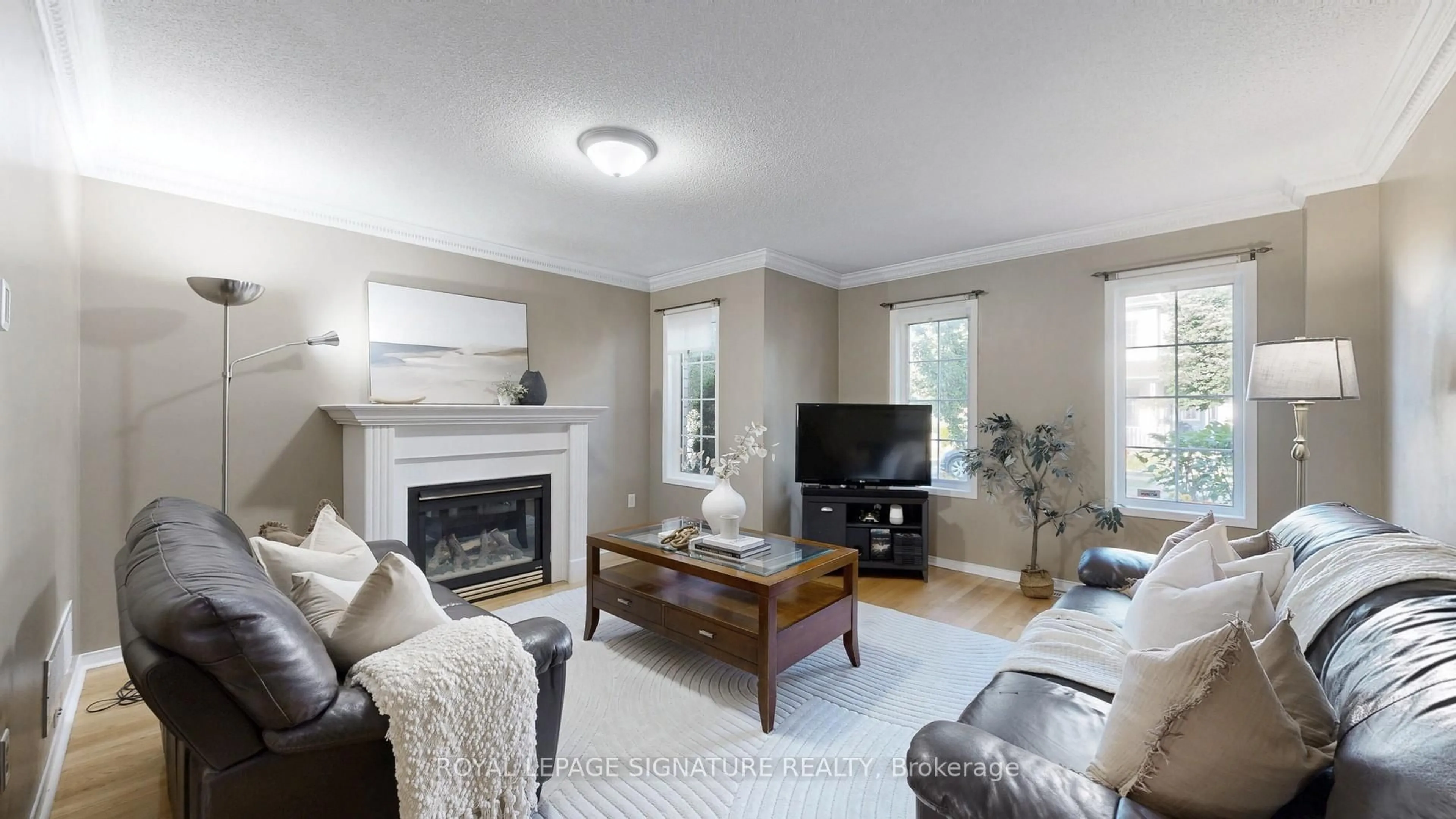 Living room with furniture, wood/laminate floor for 236 Walkerville Rd, Markham Ontario L6B 1C6