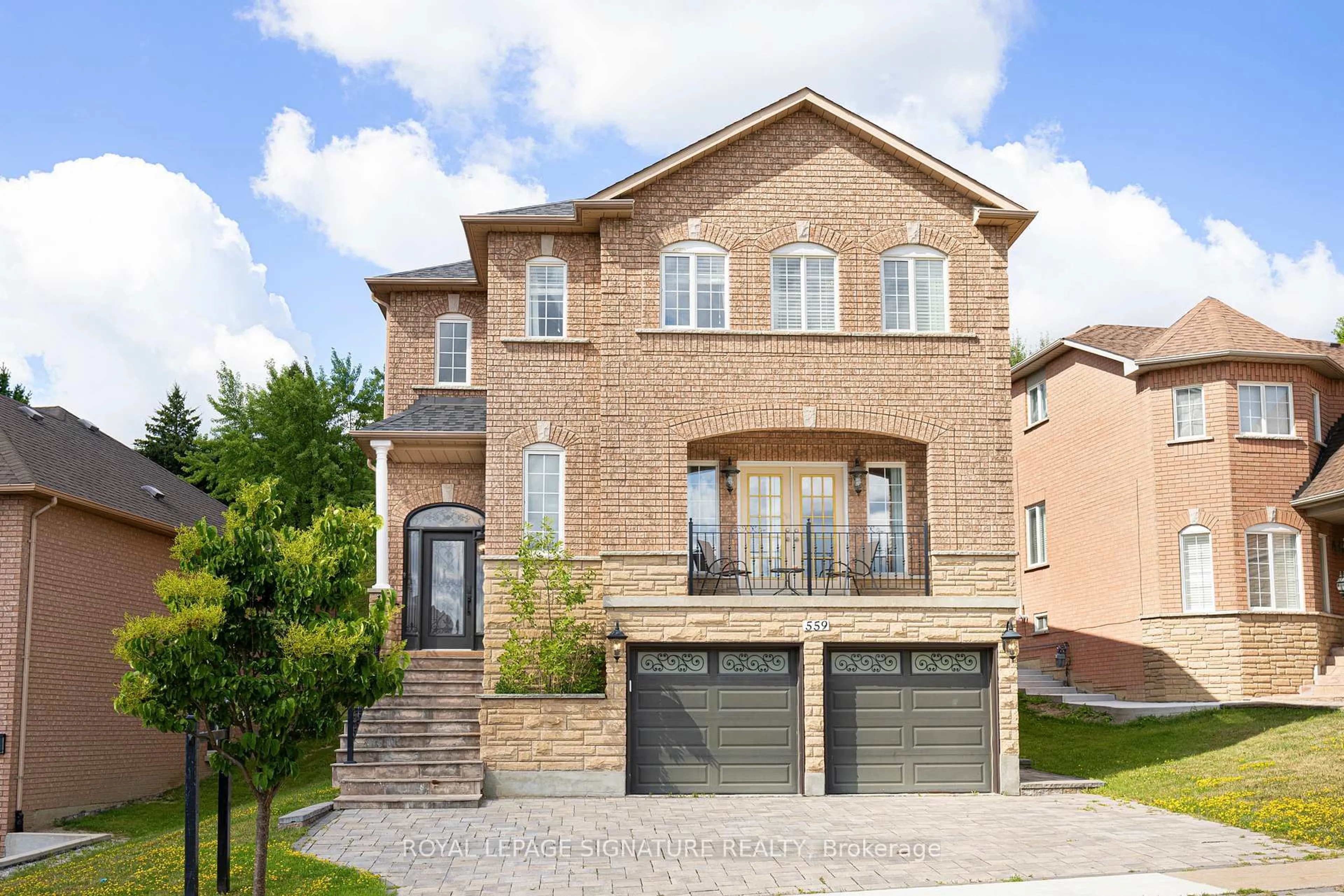 Home with brick exterior material, street for 559 Royalpark Way, Vaughan Ontario L4H 1K4