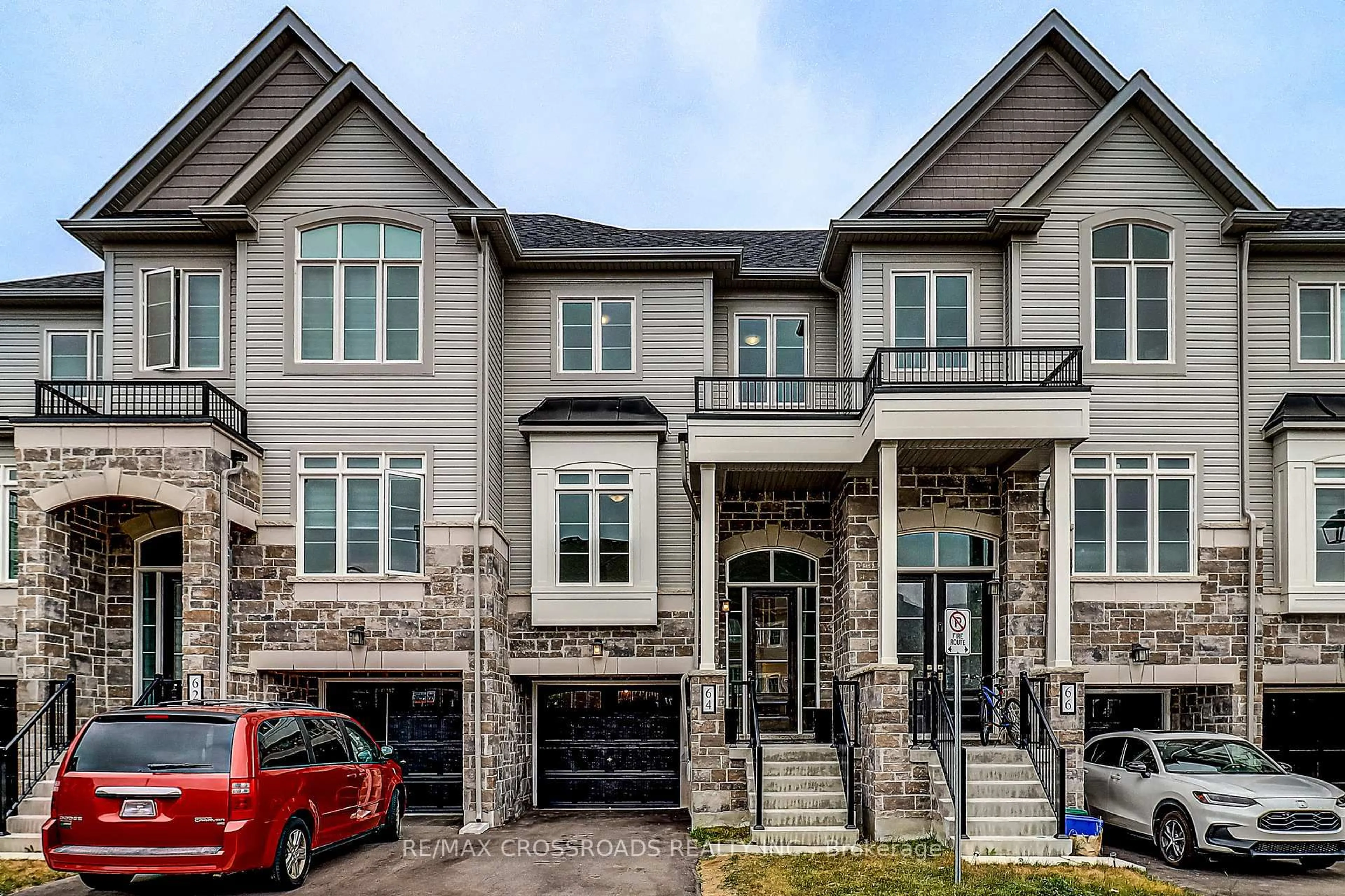 Home with brick exterior material, street for 64 Lyall Stokes Circ, East Gwillimbury Ontario L0G 1M0