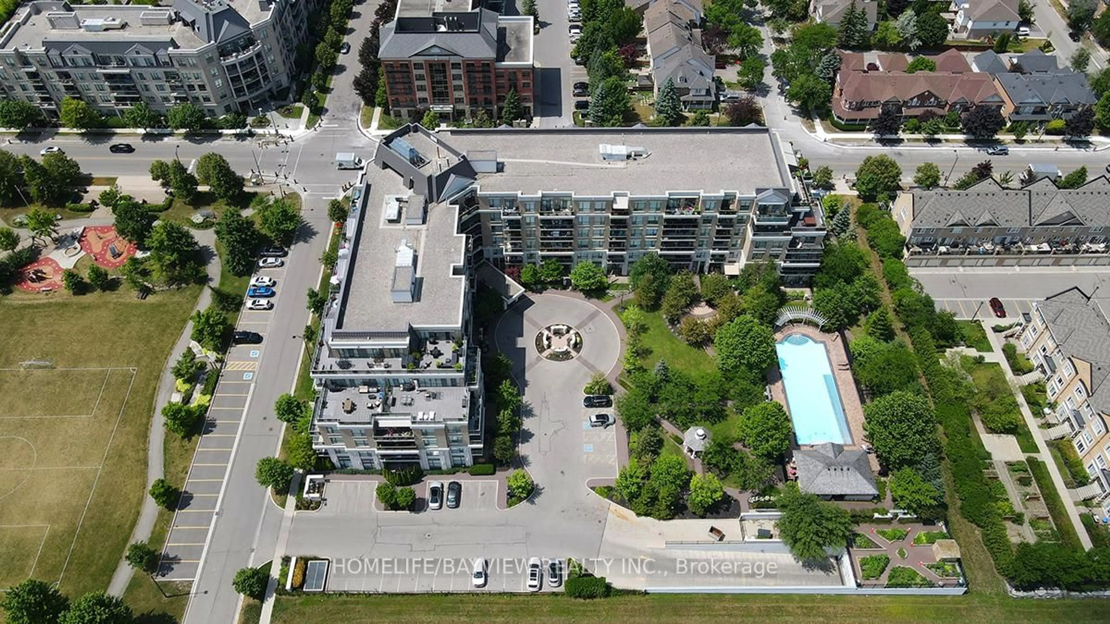 A pic from outside/outdoor area/front of a property/back of a property/a pic from drone, city buildings view from balcony for 111 Civic Square Gate #216, Aurora Ontario L4G 0S6