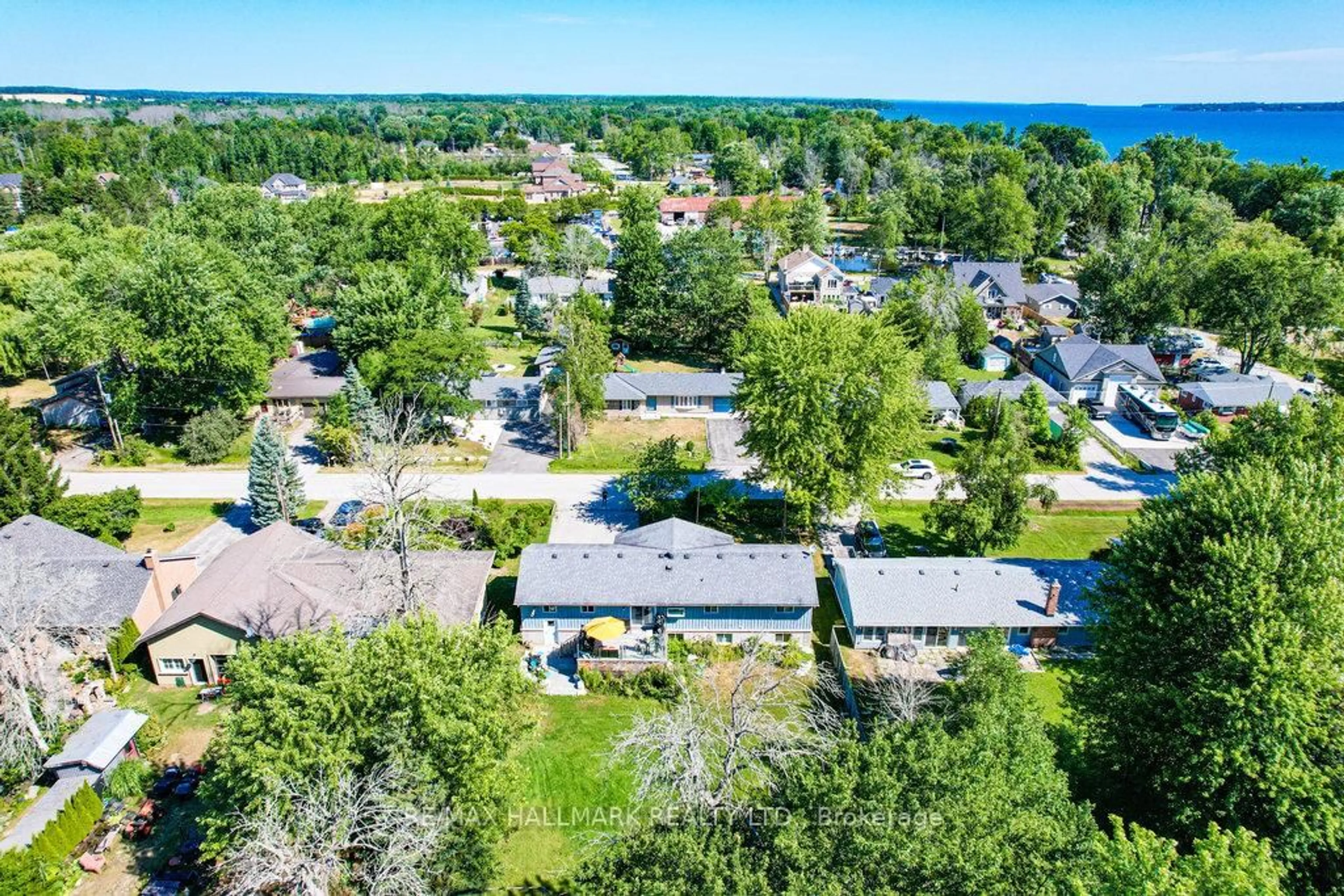 A pic from outside/outdoor area/front of a property/back of a property/a pic from drone, water/lake/river/ocean view for 1151 Birch Rd, Innisfil Ontario L0L 1R0