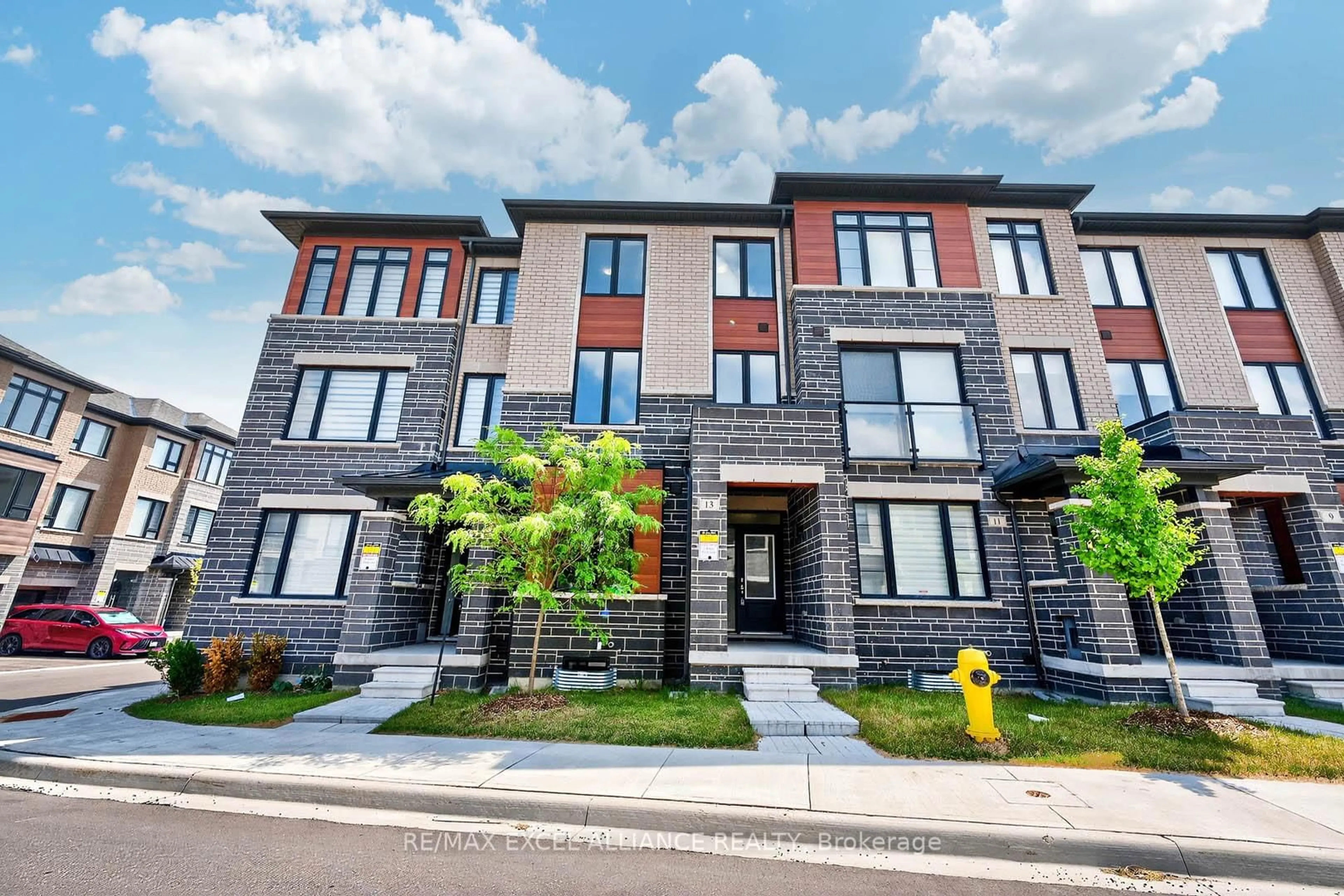 Home with brick exterior material, building for 13 Arthur White Lane, Markham Ontario L6E 0W2